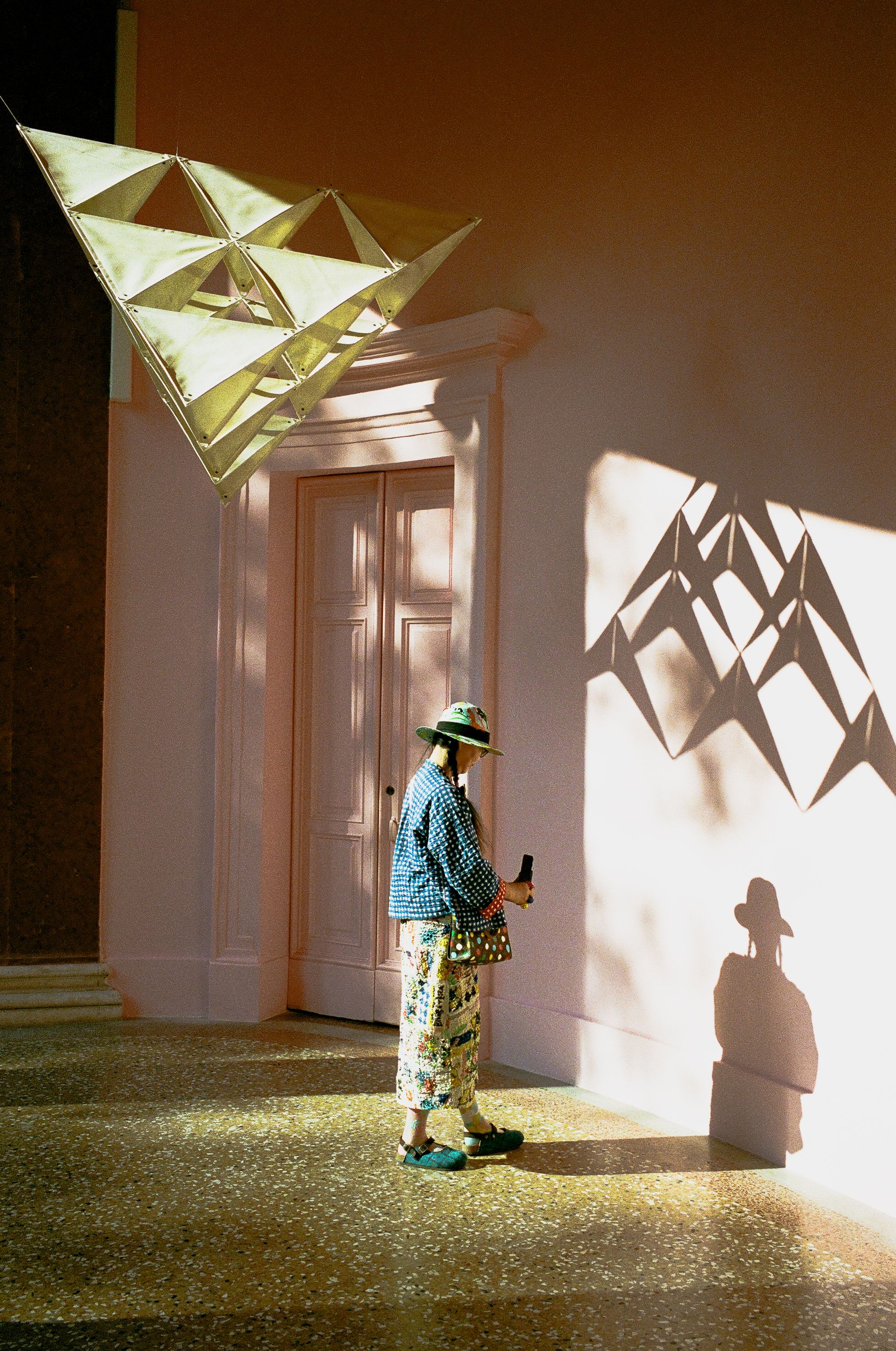A visitor becomes part of the artwork at the French Pavilion, Venice Biennale 2026.