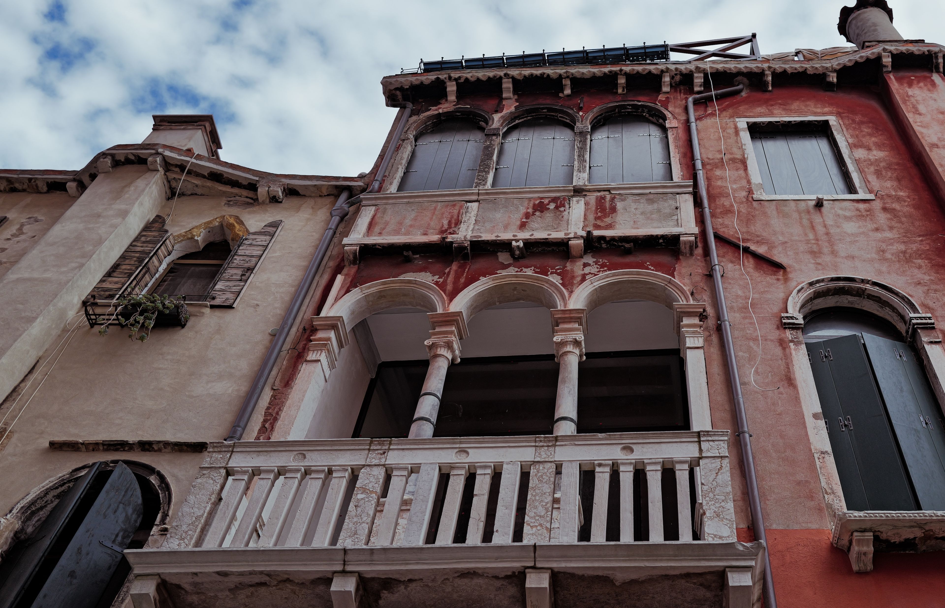 The beauty of imperfection — weathered façades, faded colours and centuries of architectural detail in Venice.
