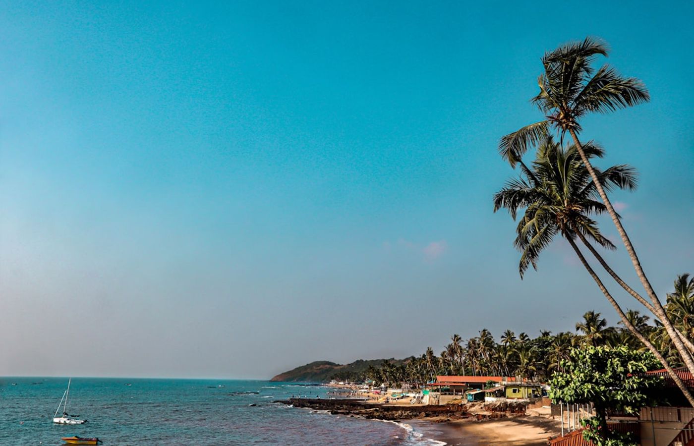 Anjuna Beach - Red Cliffs, Rock Pools and the Wednesday Market