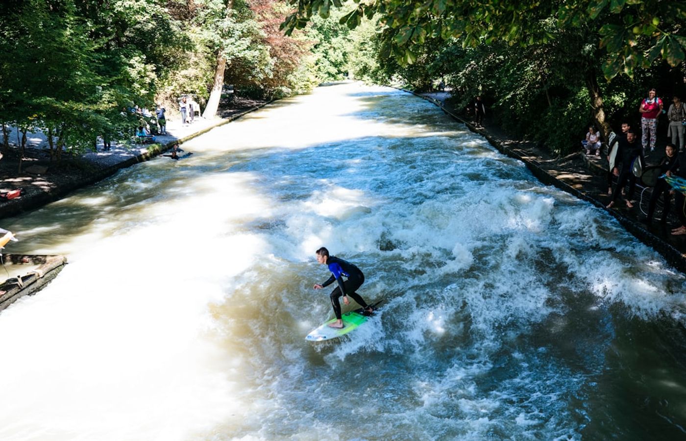 Englischer Garten and the Eisbach Wave - 375 Hectares That Absorb the Crowd
