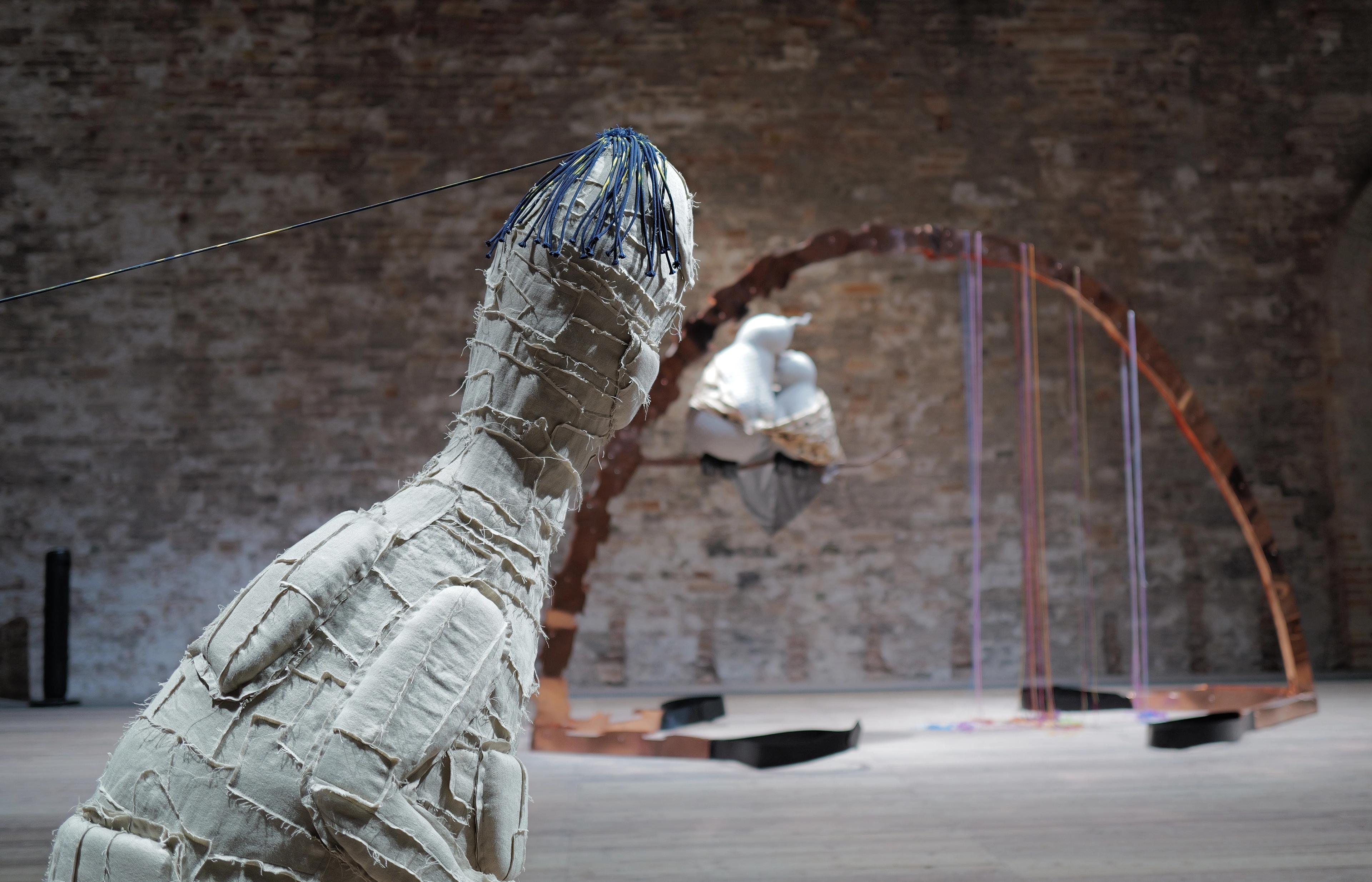 A stitched sculptural form inside one of the Arsenale’s historic exhibition halls.