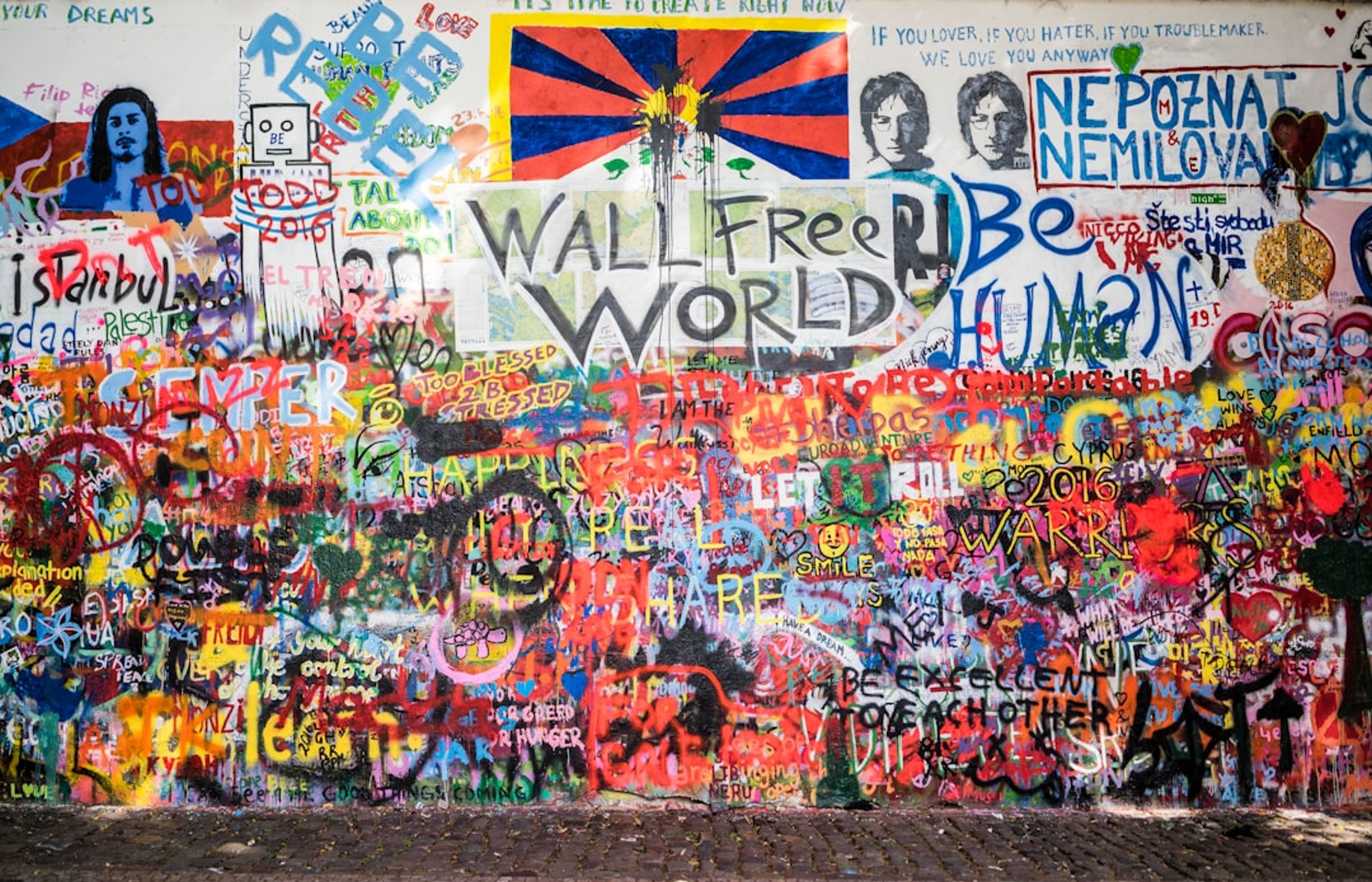 Lennon Wall - A Graffiti-Covered Tribute to Peace and Free Expression