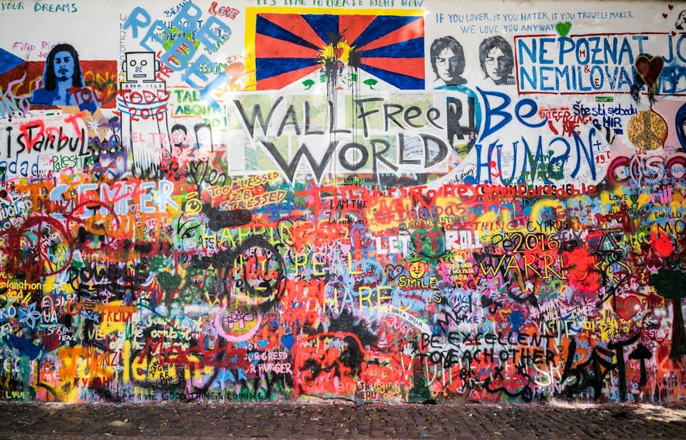 Lennon Wall - A Graffiti-Covered Tribute to Peace and Free Expression