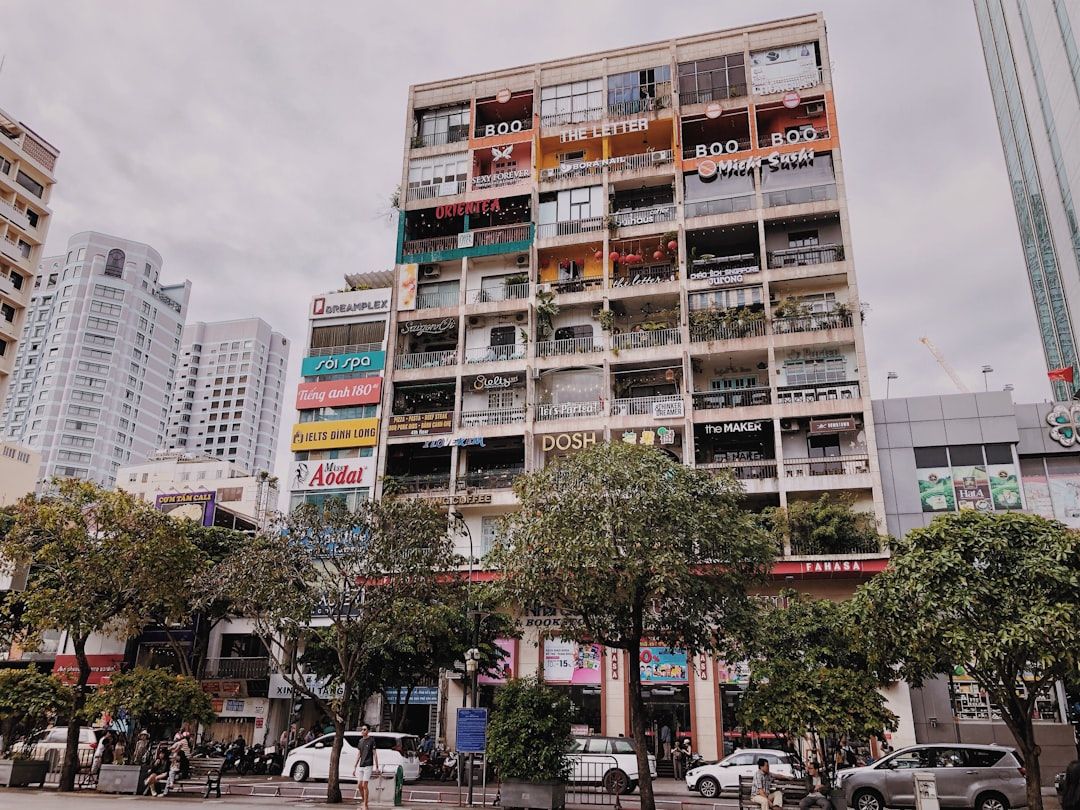 Nguyen Hue Walking Street and the Cafe Apartments - The Pedestrian Boulevard and Its Vertical Cafe Block
