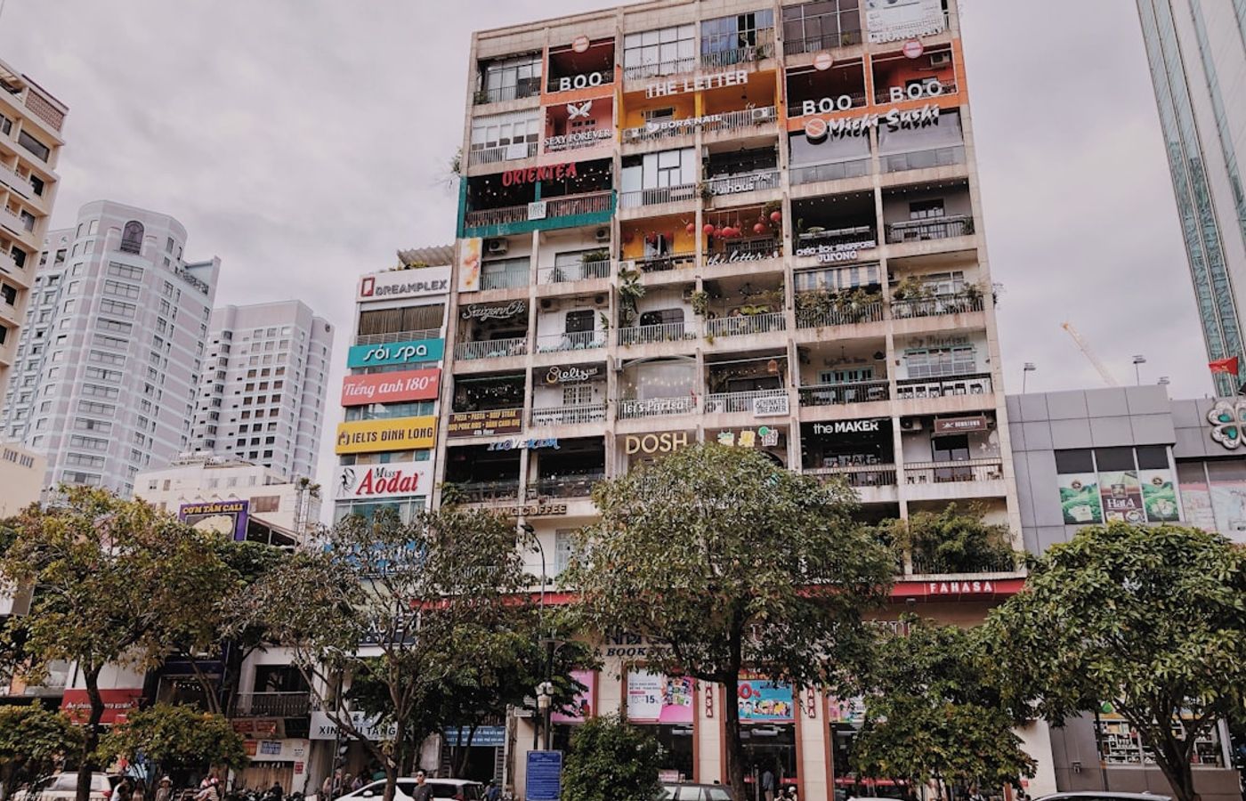 Nguyen Hue Walking Street and the Cafe Apartments - The Pedestrian Boulevard and Its Vertical Cafe Block