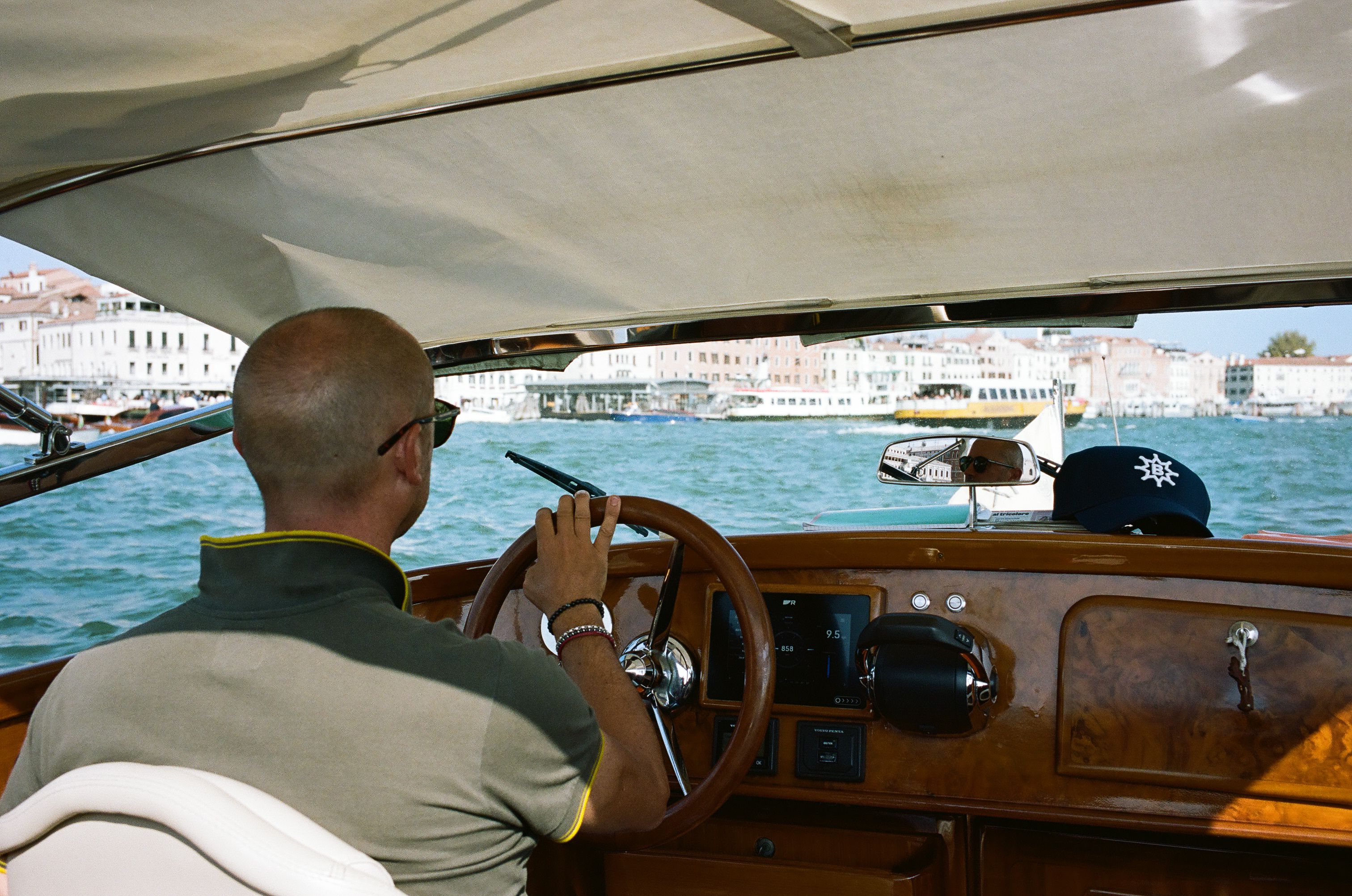 The city seen first from the boat: a water-level introduction to Venice.