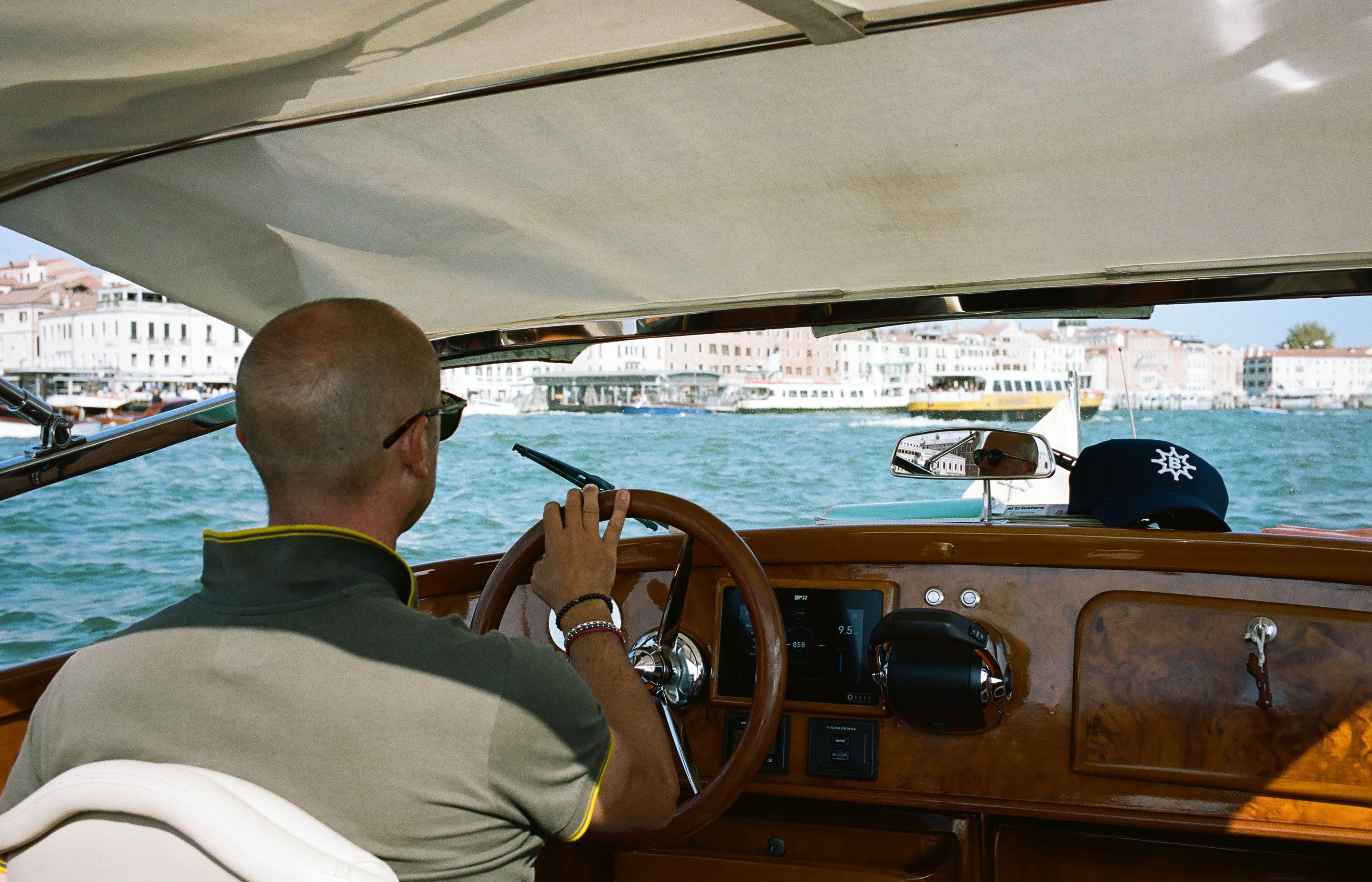 The city seen first from the boat: a water-level introduction to Venice.