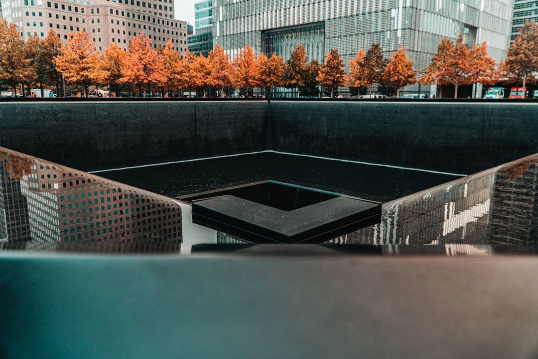 The 9/11 Memorial and Museum - Reflection at Ground Zero