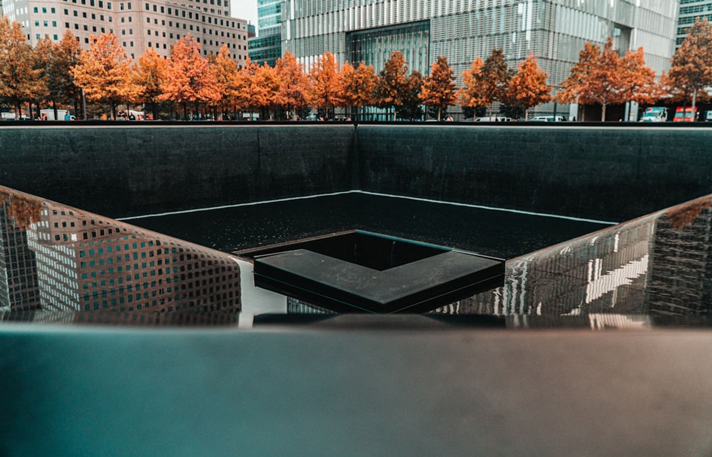 The 9/11 Memorial and Museum - Reflection at Ground Zero