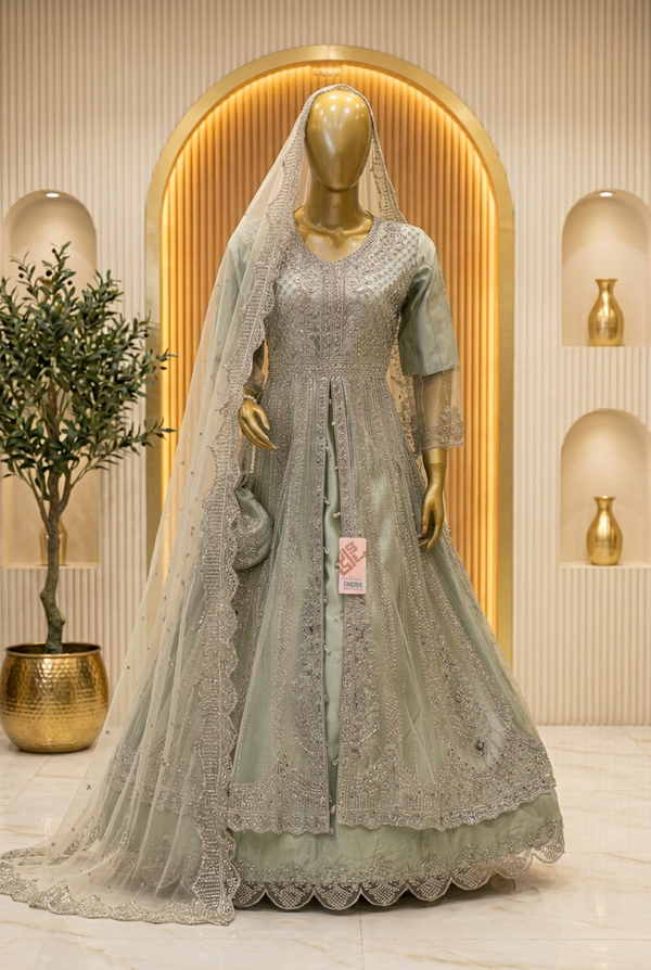 Sage Green Layered Gown | Silver-Tone Floral Embroidery | Pakistani Wedding Wear | Scalloped Hem, Ivory Dupatta & Matching Potli | Wedding Collection — Net by Bawany Threads & Style