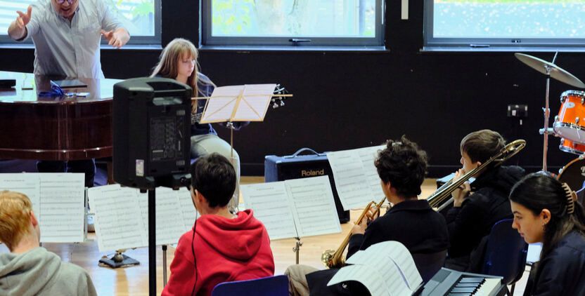 A jazz and world-music ensemble playing live.