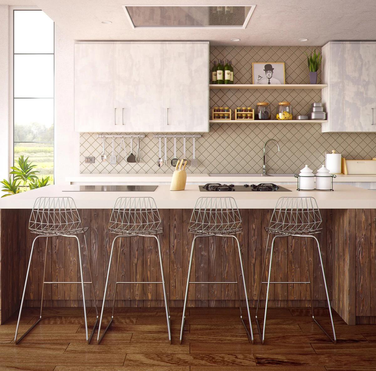 Modern white south west kitchen layout following practical Vastu design principles with natural lighting and functional planning.