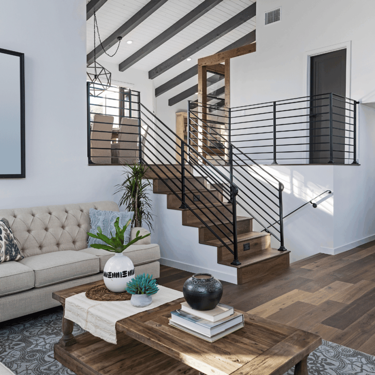 Living Room with Stairs Design
