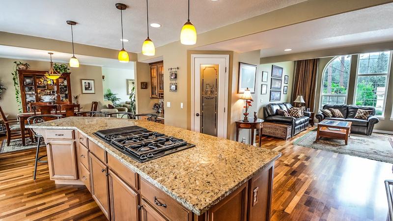 Open-concept south west kitchen with island showcasing a practical Vastu-friendly layout, proper ventilation, and efficient workspace.