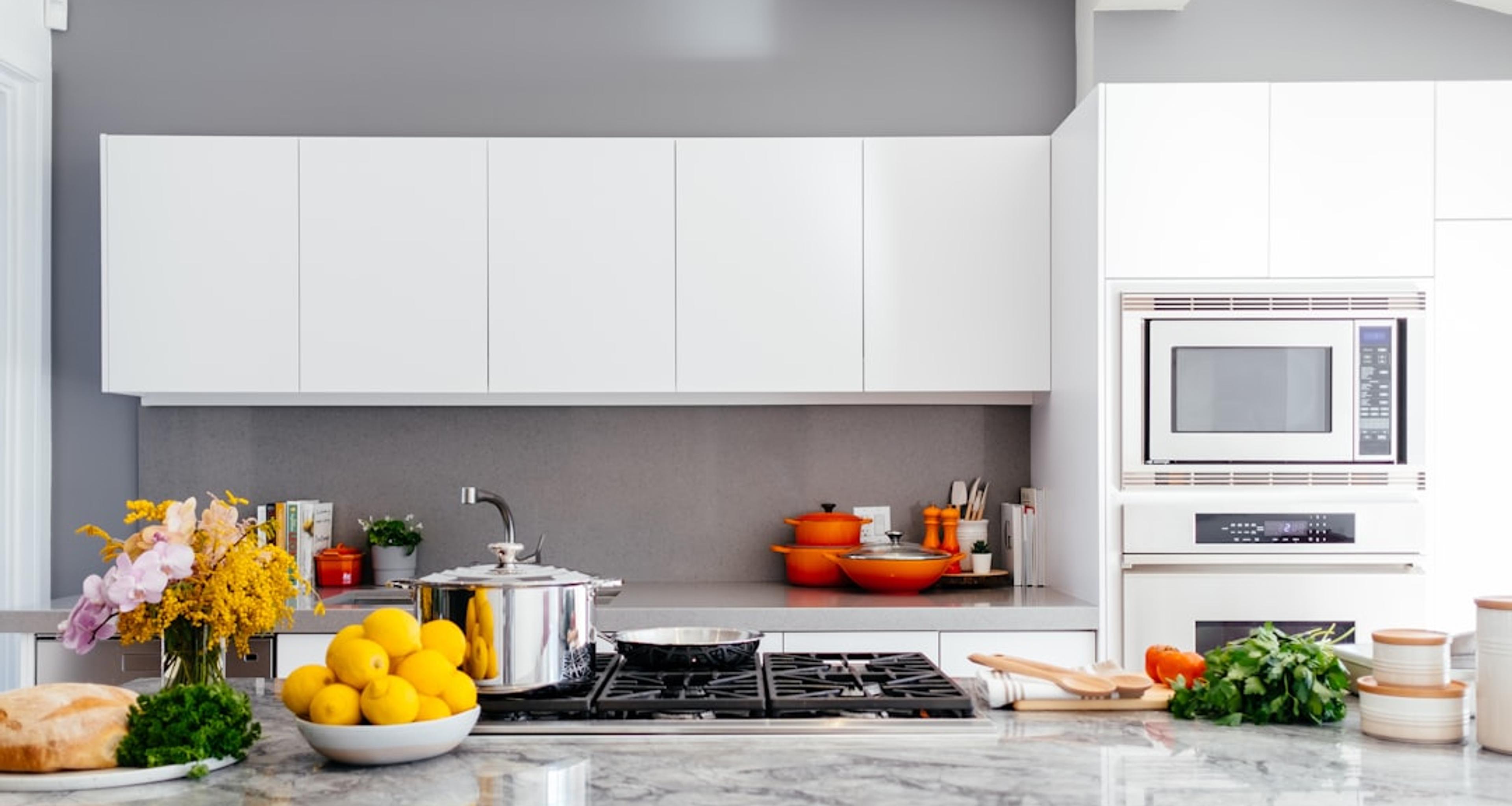 Modern white kitchen with marble countertop