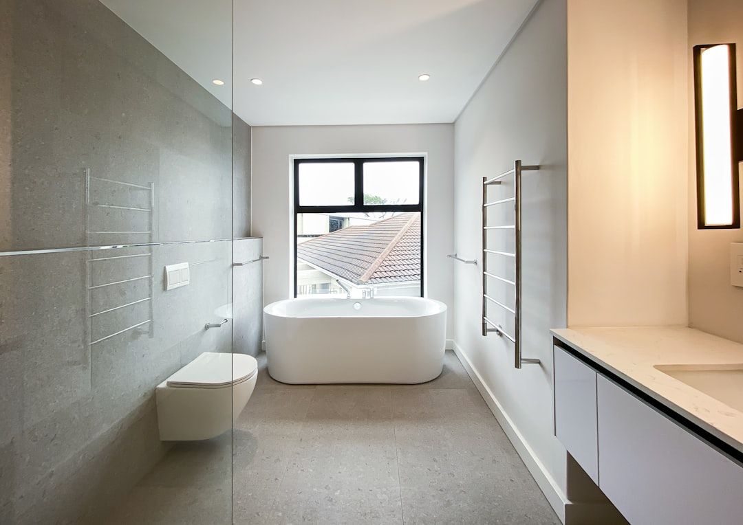Bathroom with freestanding tub and glass walk-in shower