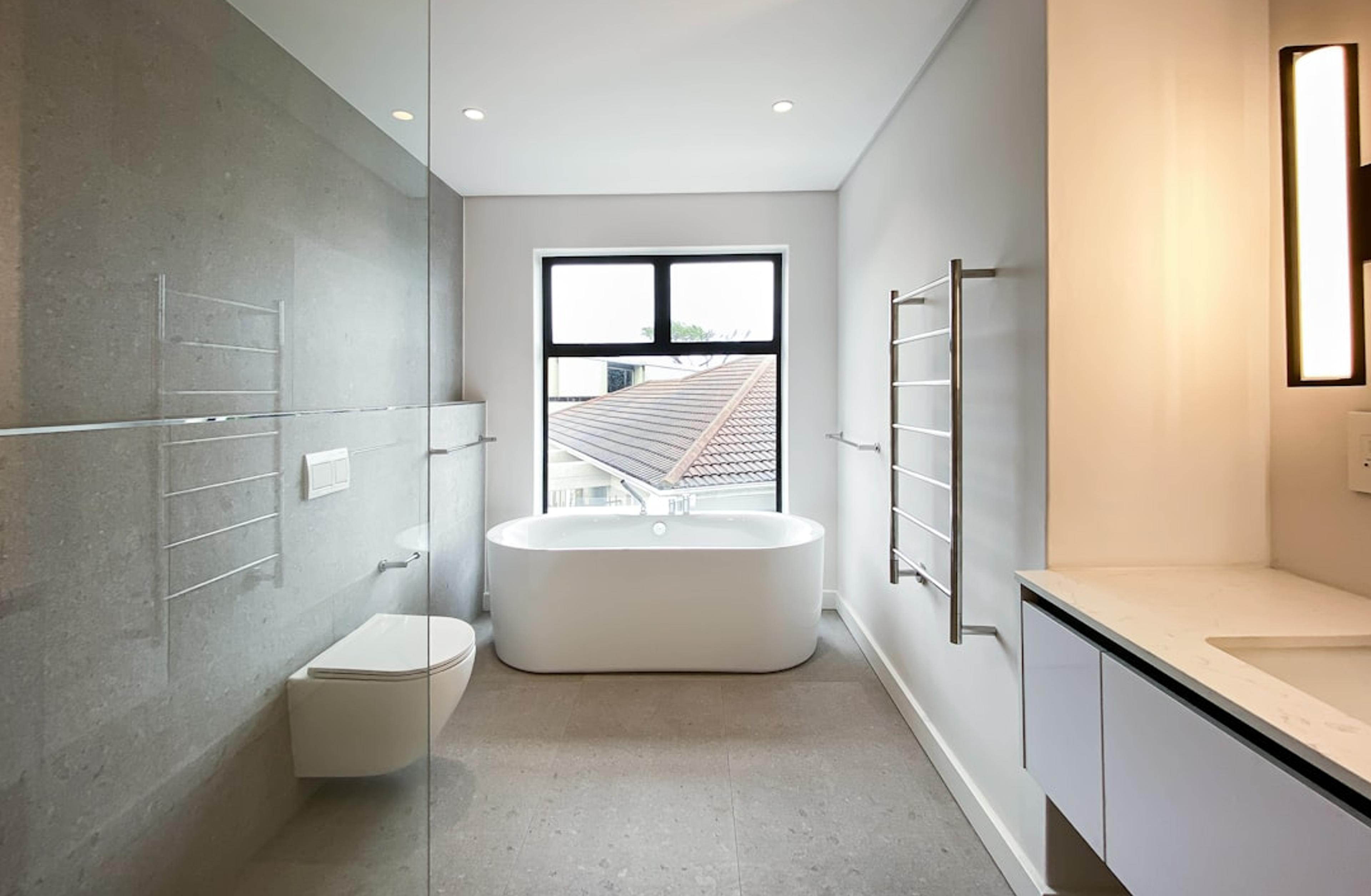 Bathroom with freestanding tub and glass walk-in shower