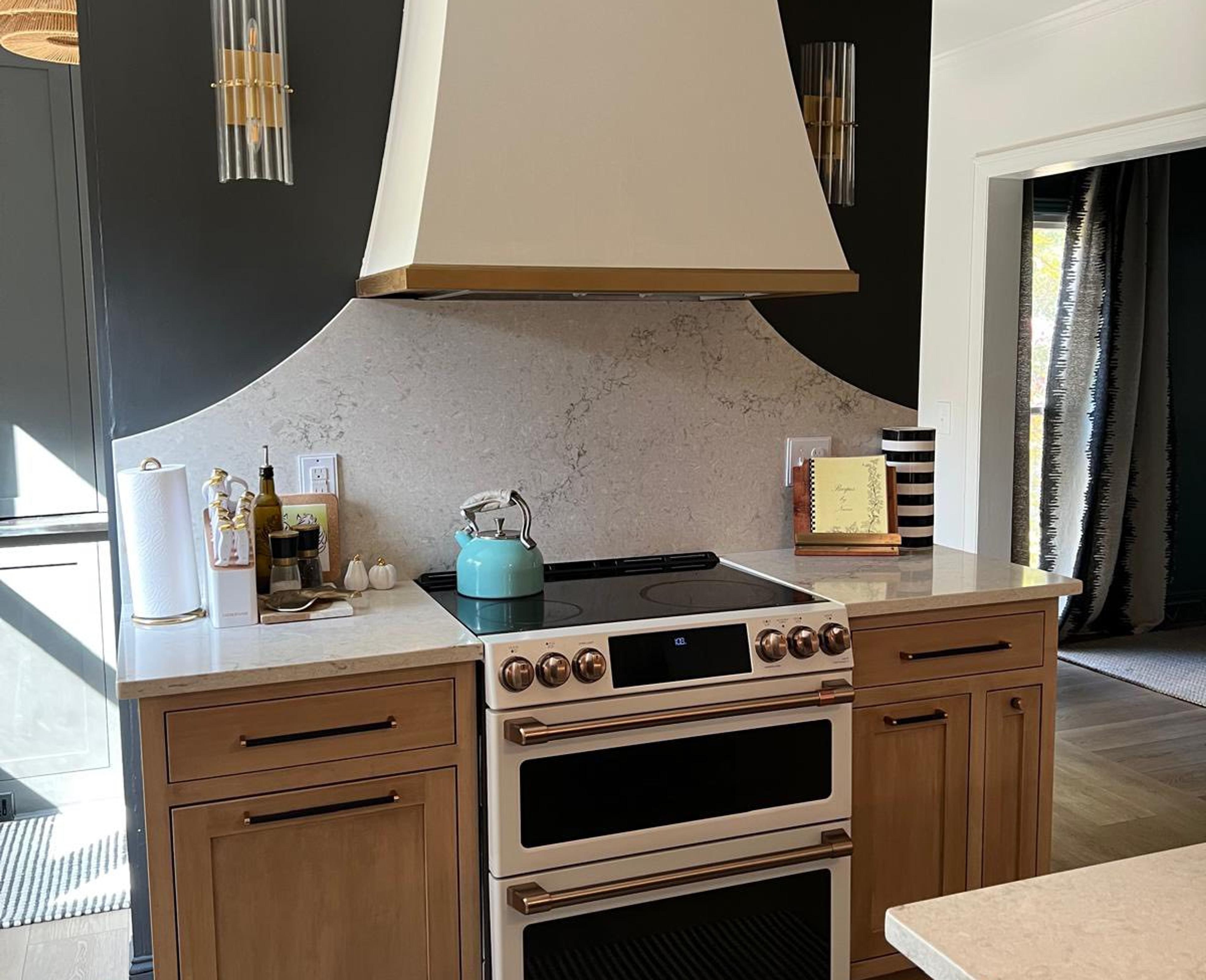 Two-tone kitchen with custom cream hood