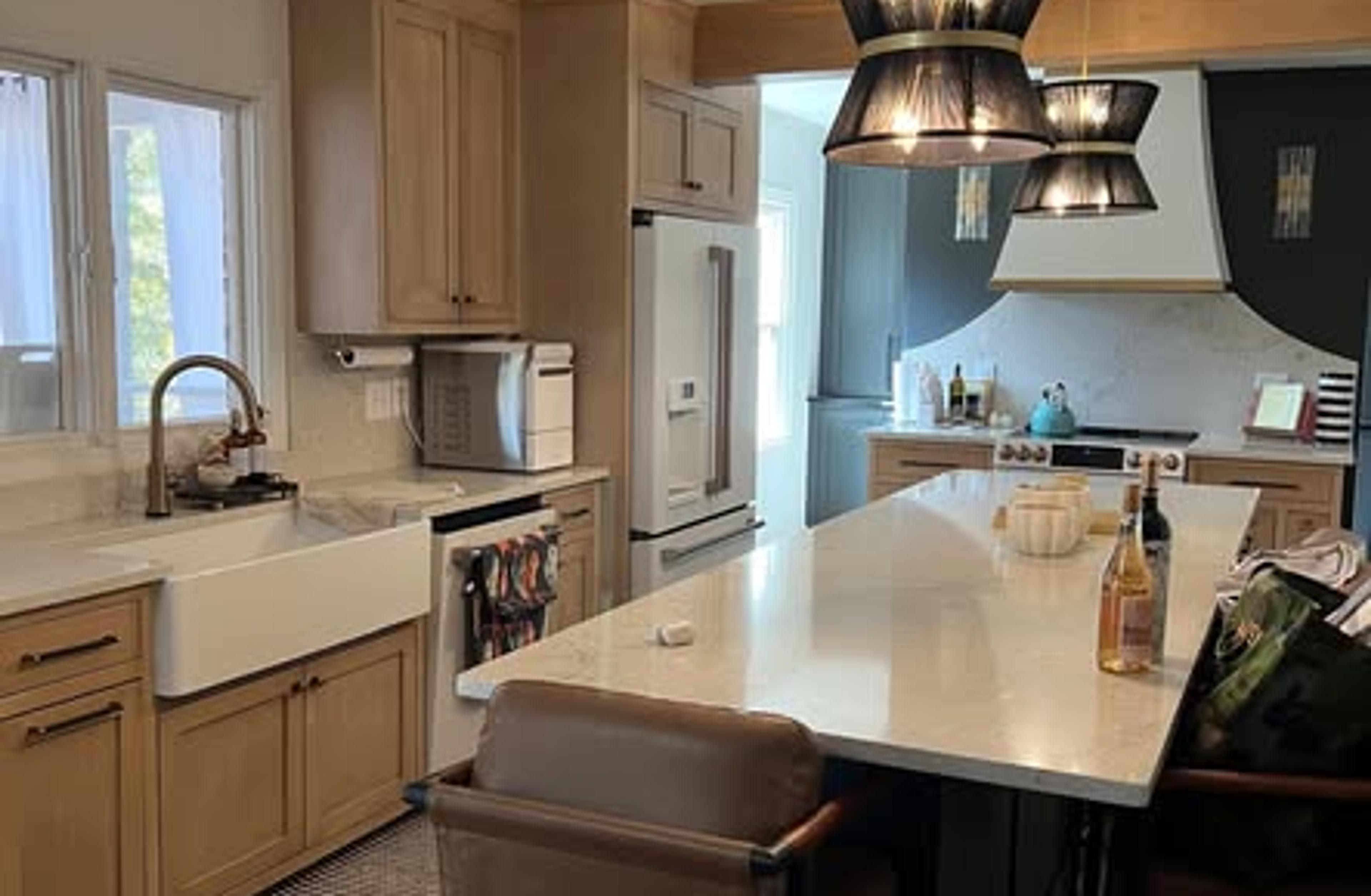 Warm wood family kitchen with island seating