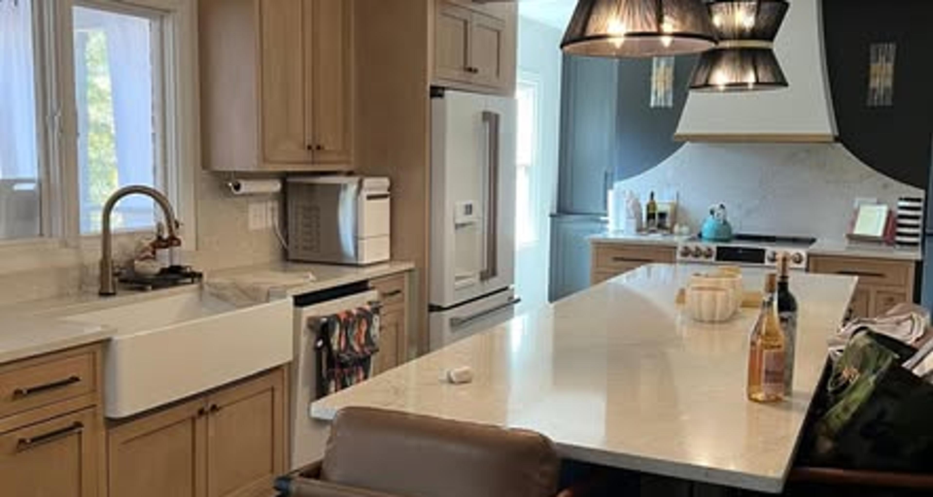 Warm wood family kitchen with island seating