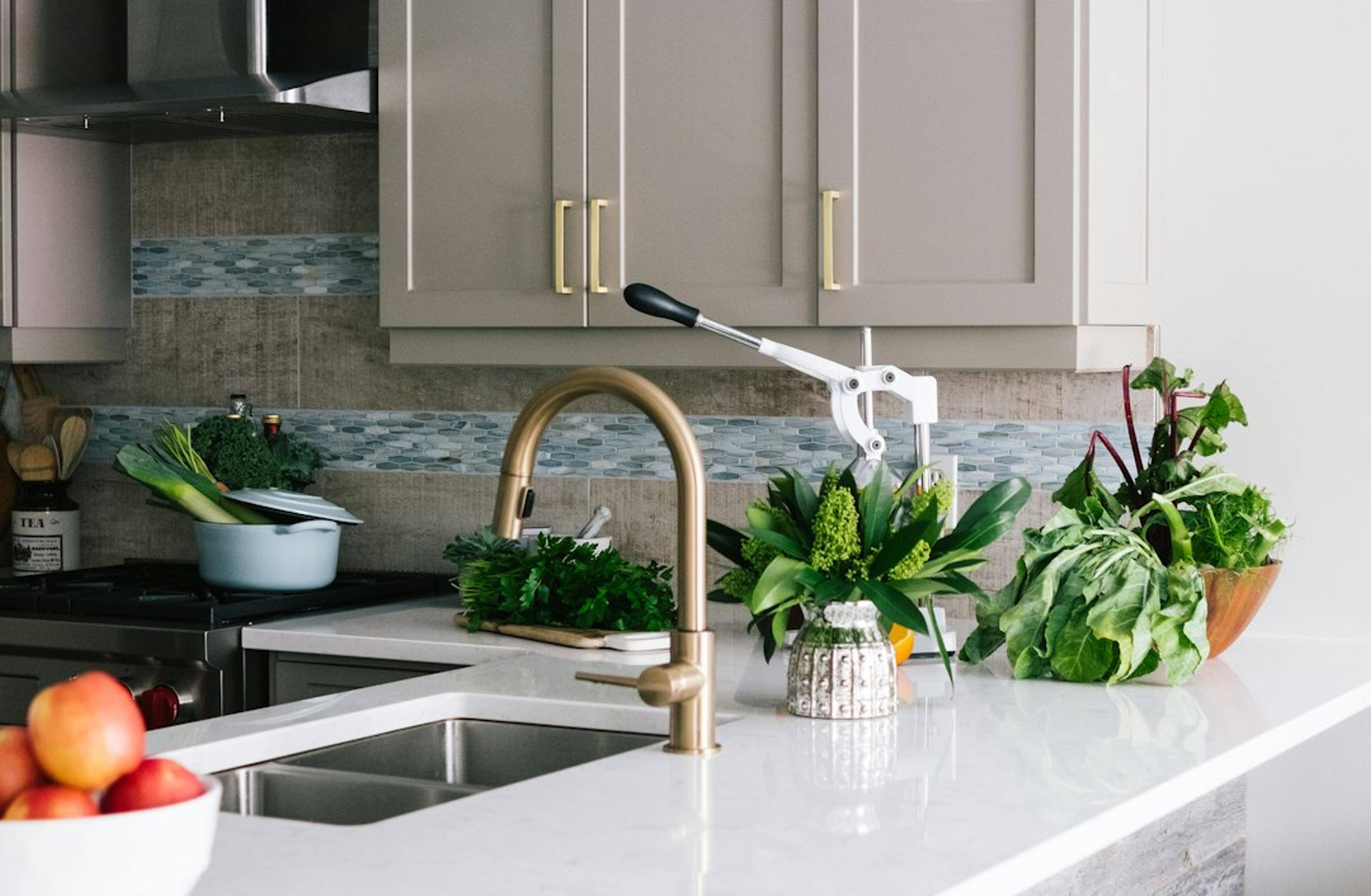 Greige shaker kitchen with quartz island