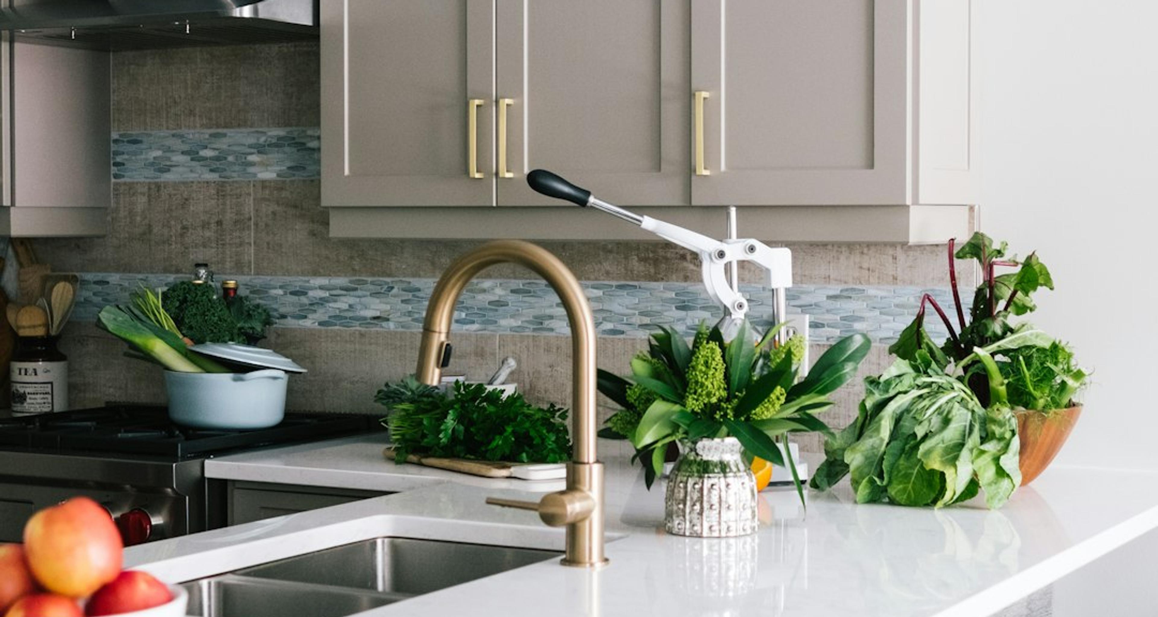Greige shaker kitchen with quartz island