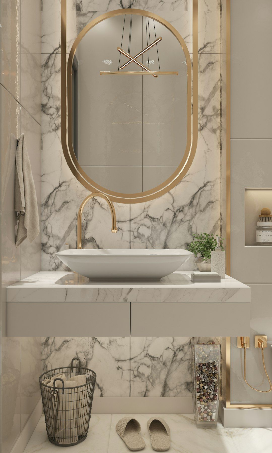 Gold-framed mirror and marble in luxury powder bath