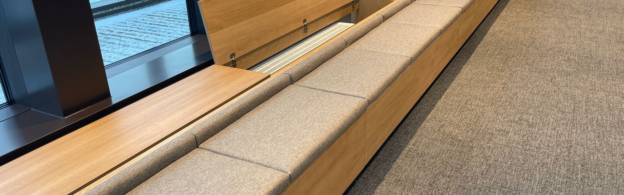 inside-sitting-bench-with-radiator-coverings-adprosjekt