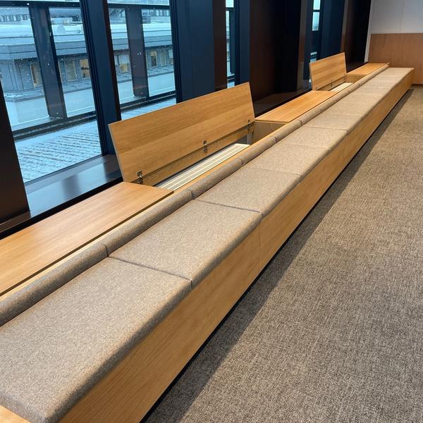 inside-sitting-bench-with-radiator-coverings-adprosjekt