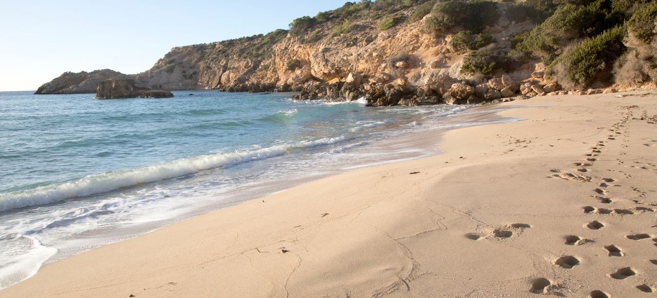 Footprints at Cala Tarida Beach