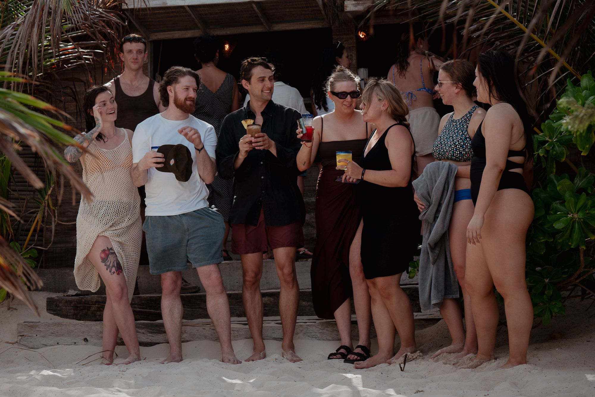 Domaine team members at the beachside bar