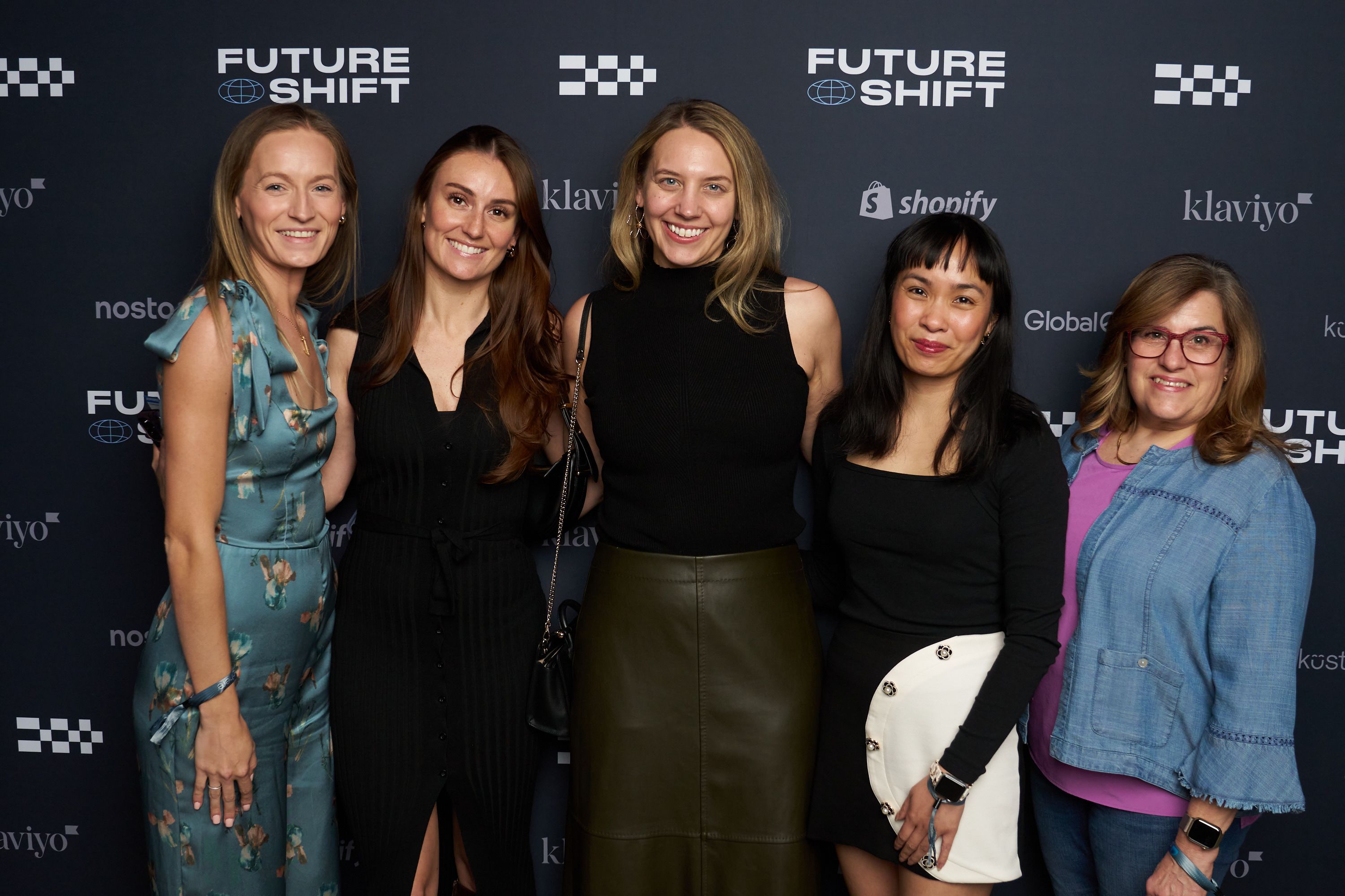Guests in front of our step & repeat