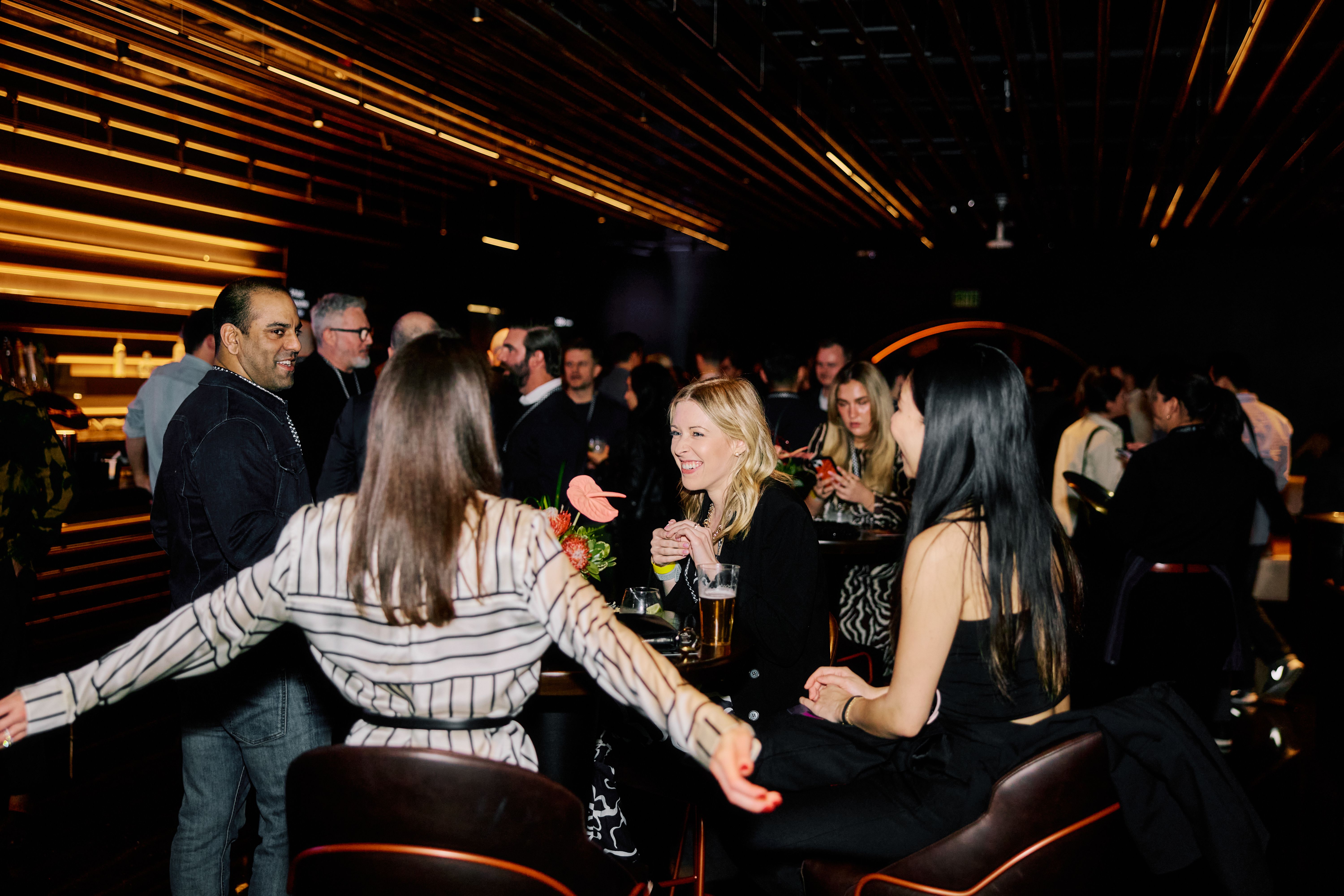 Guests enjoying the event in the Theory Lounge at the Las Vegas Sphere