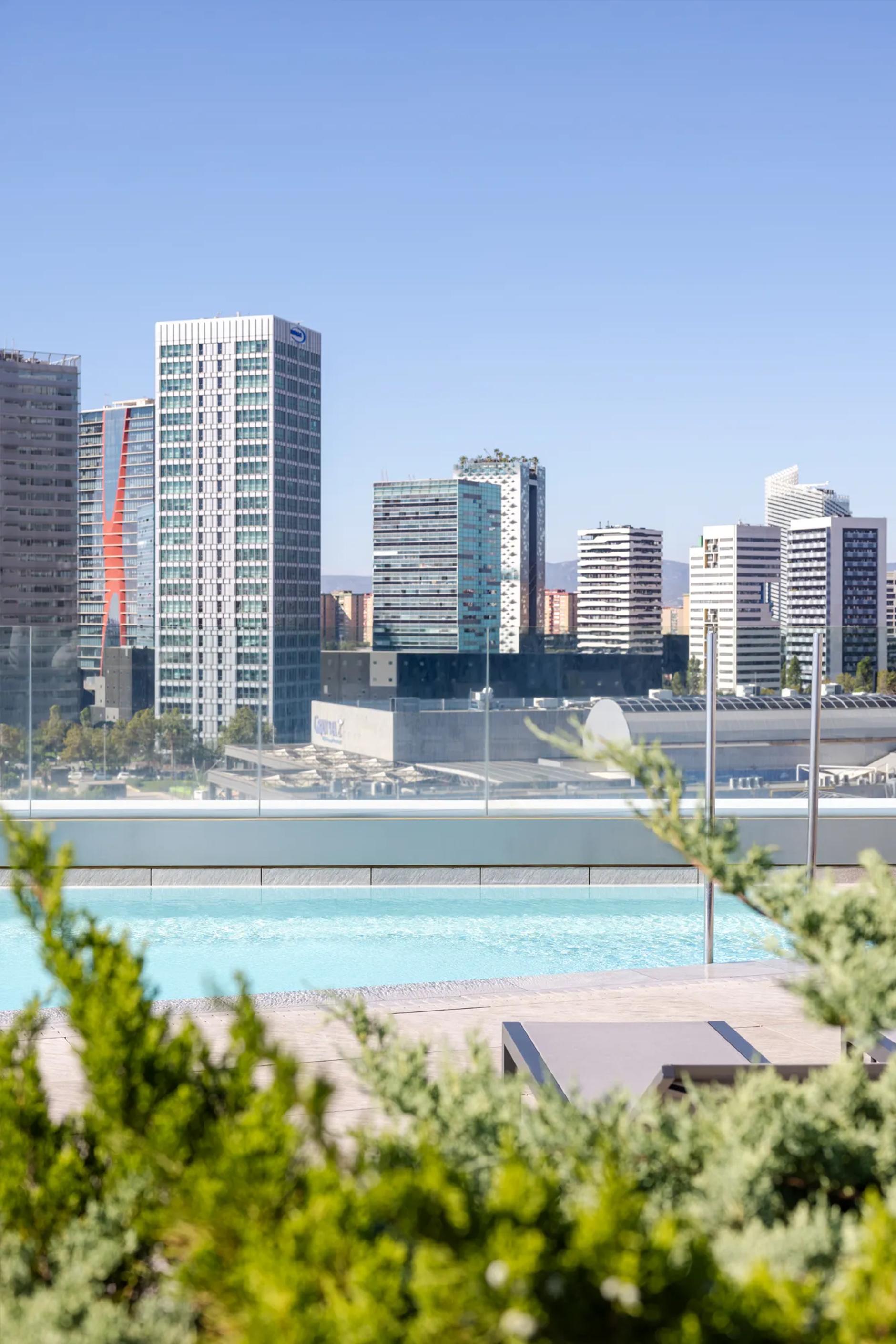 view of city from the rooftop pool