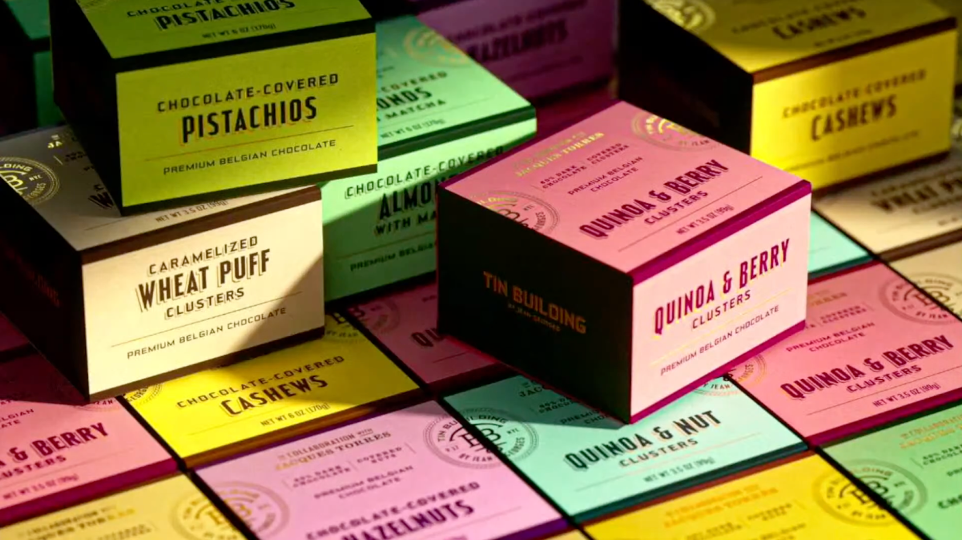 Colorful food packaging for pistachios, wheat puff clusters, cashews, and more.