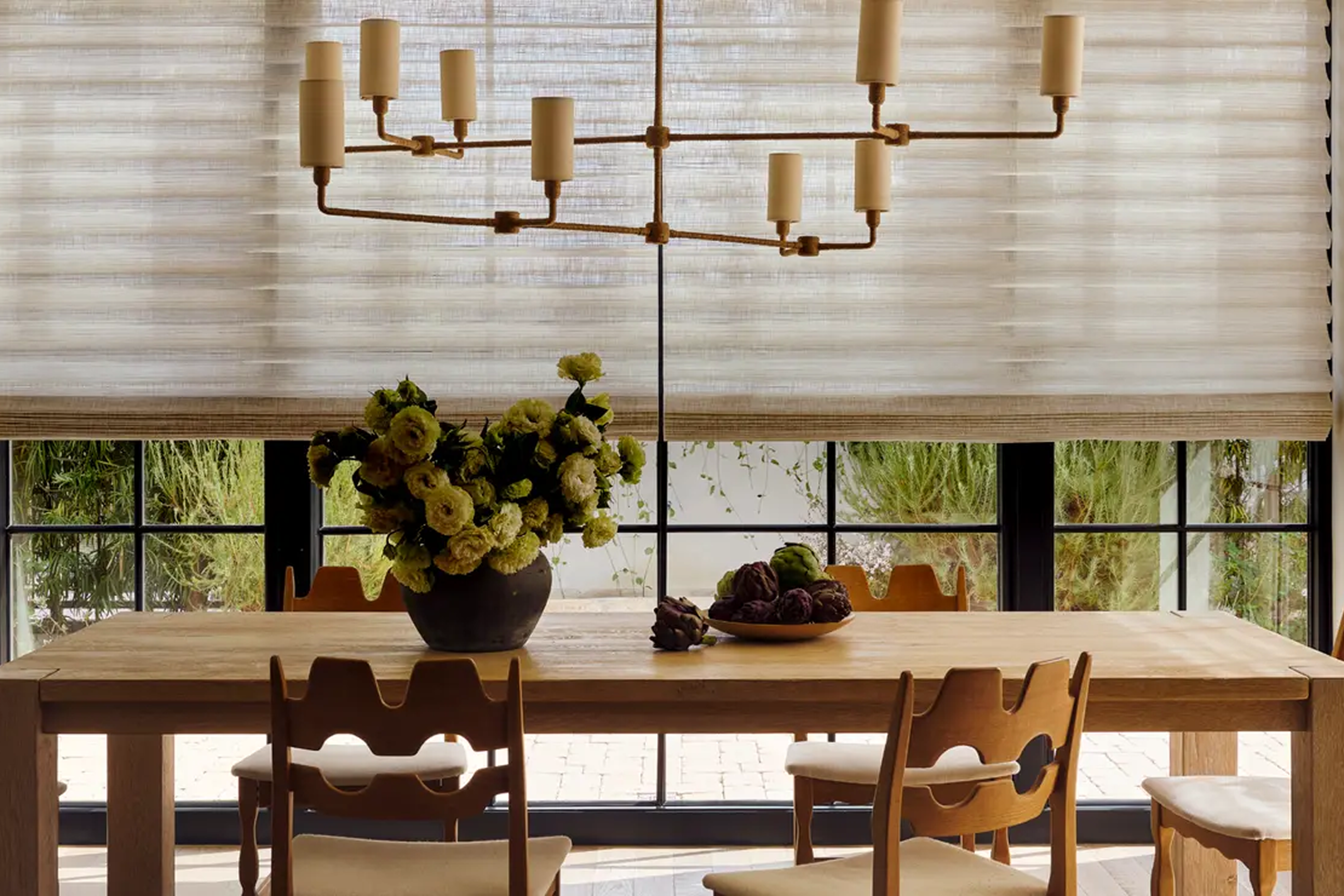 Dinner table setting with shades from Hunter Douglas