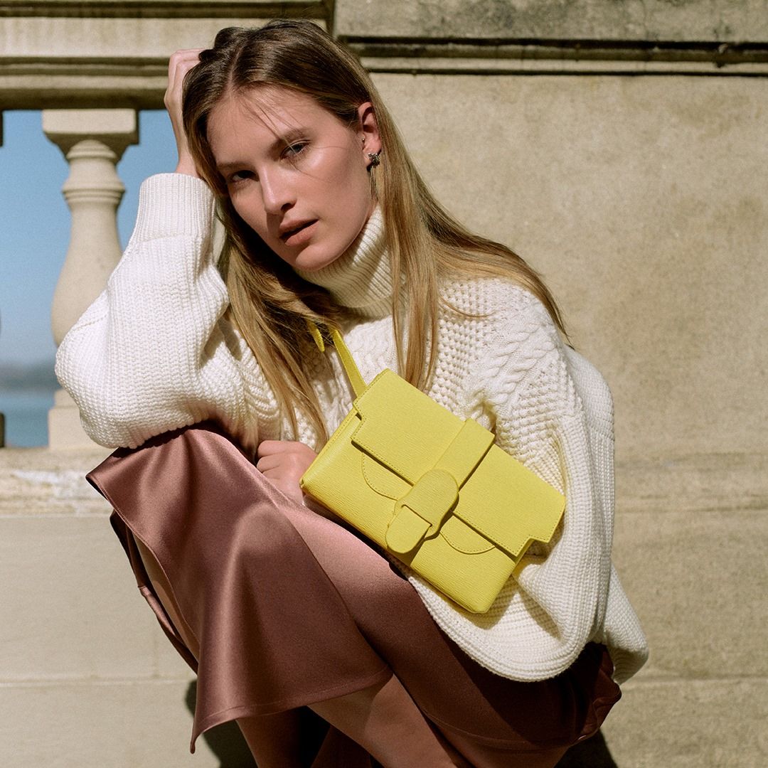 Model with Yellow Bag