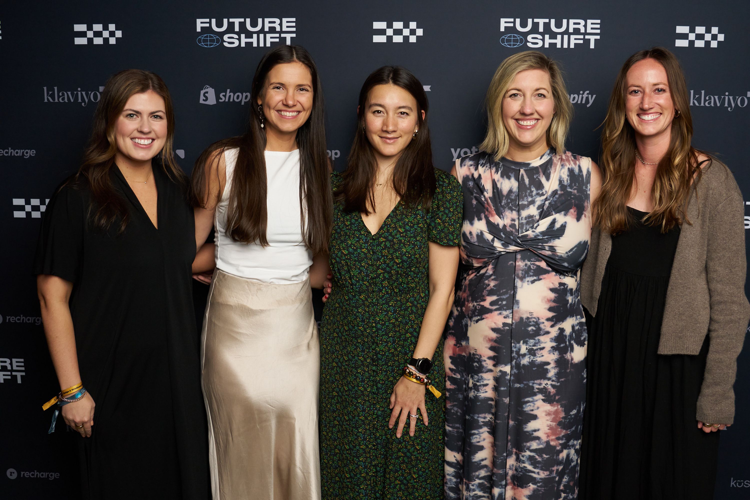 Guests in front of our step & repeat