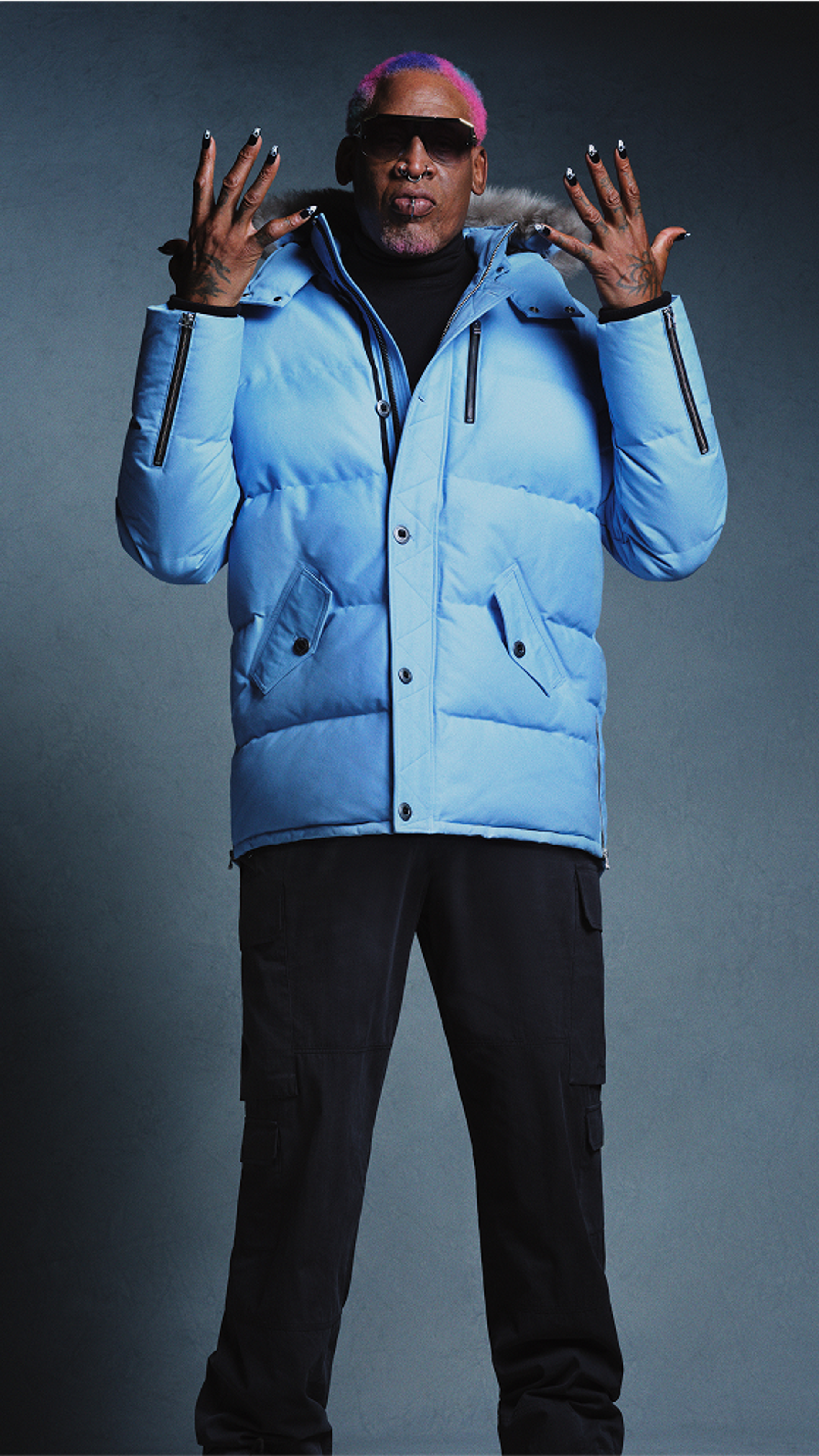 Model wearing light blue jacket Moose Knuckles