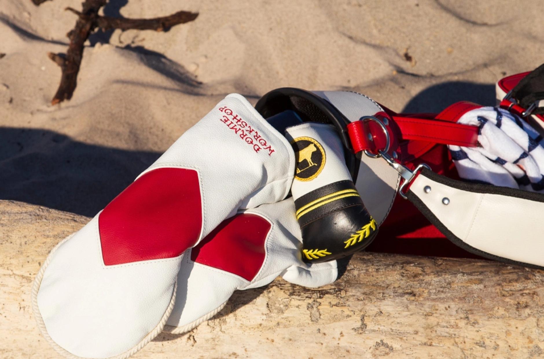Golf bag sitting on sand
