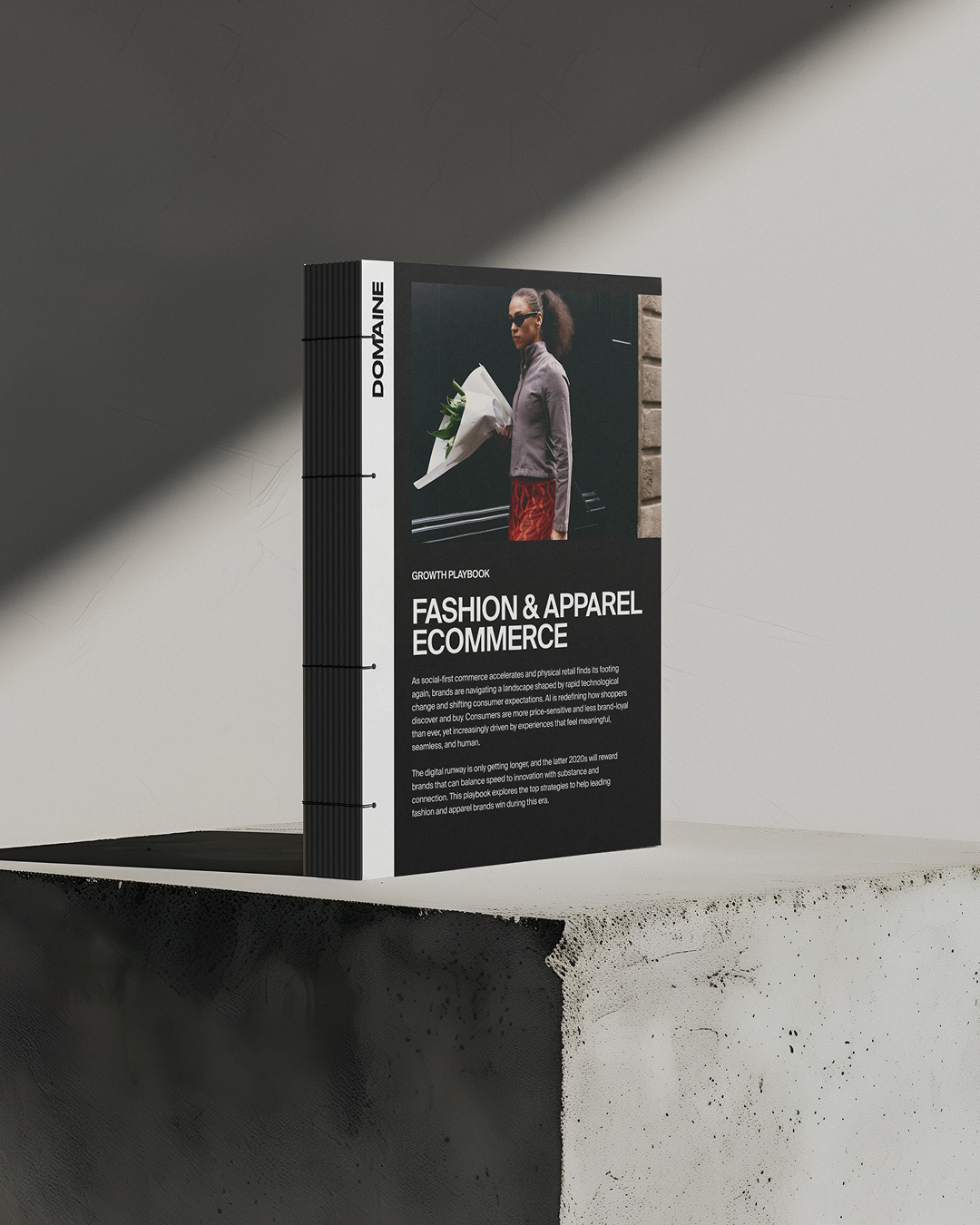 Mockup of fashion whitepaper on a cement block
