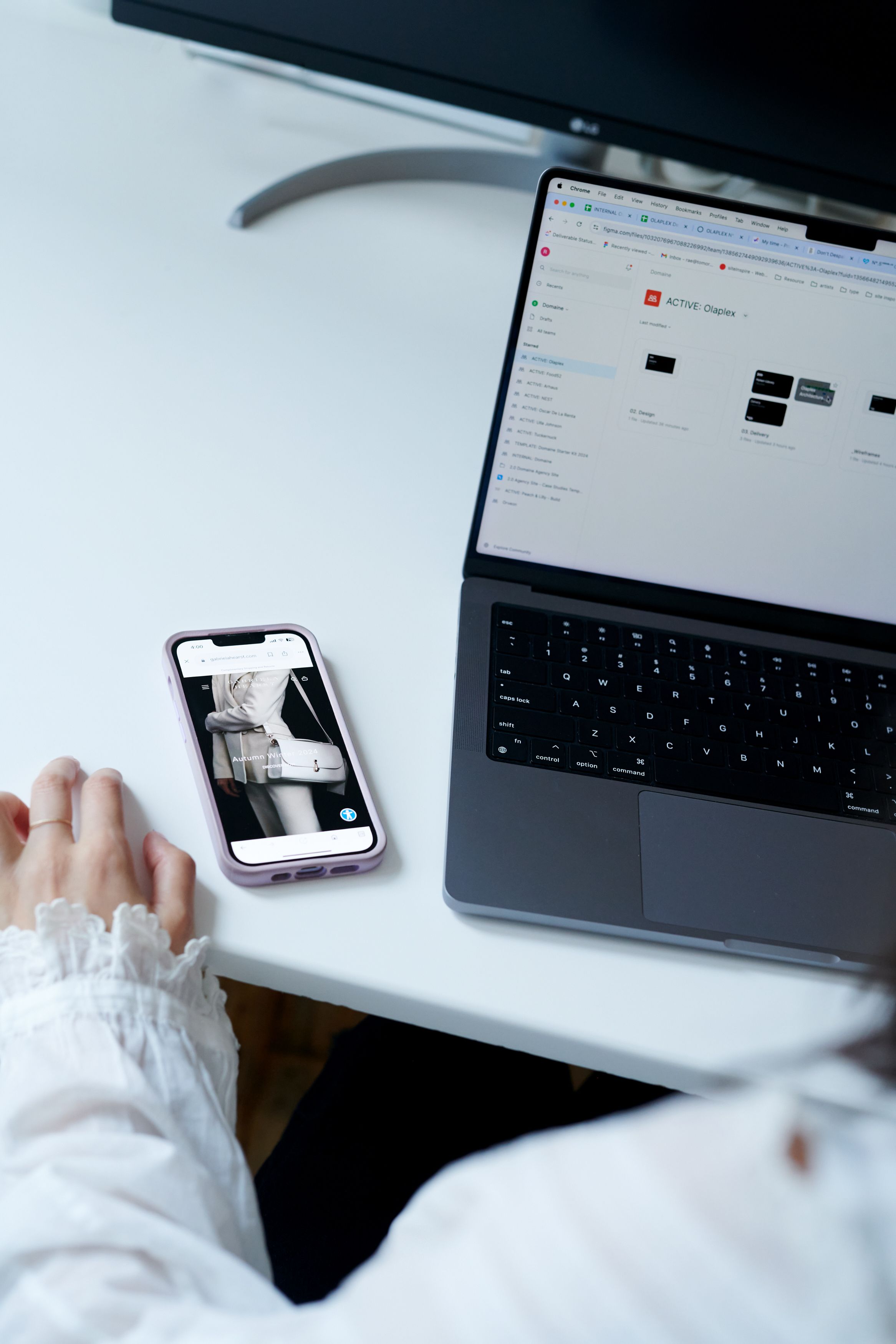 Phone and laptop on desk