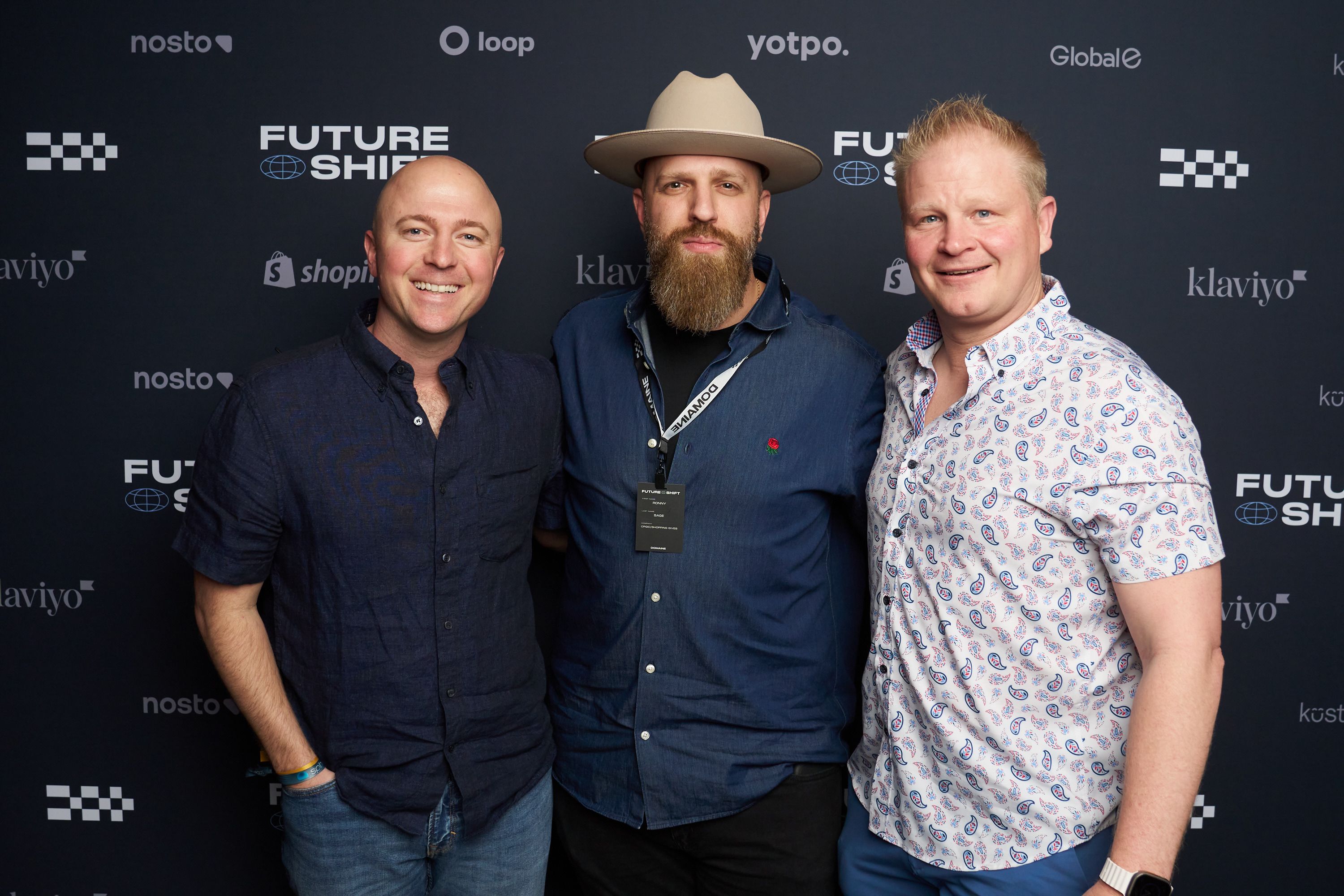 Guests in front of our step & repeat