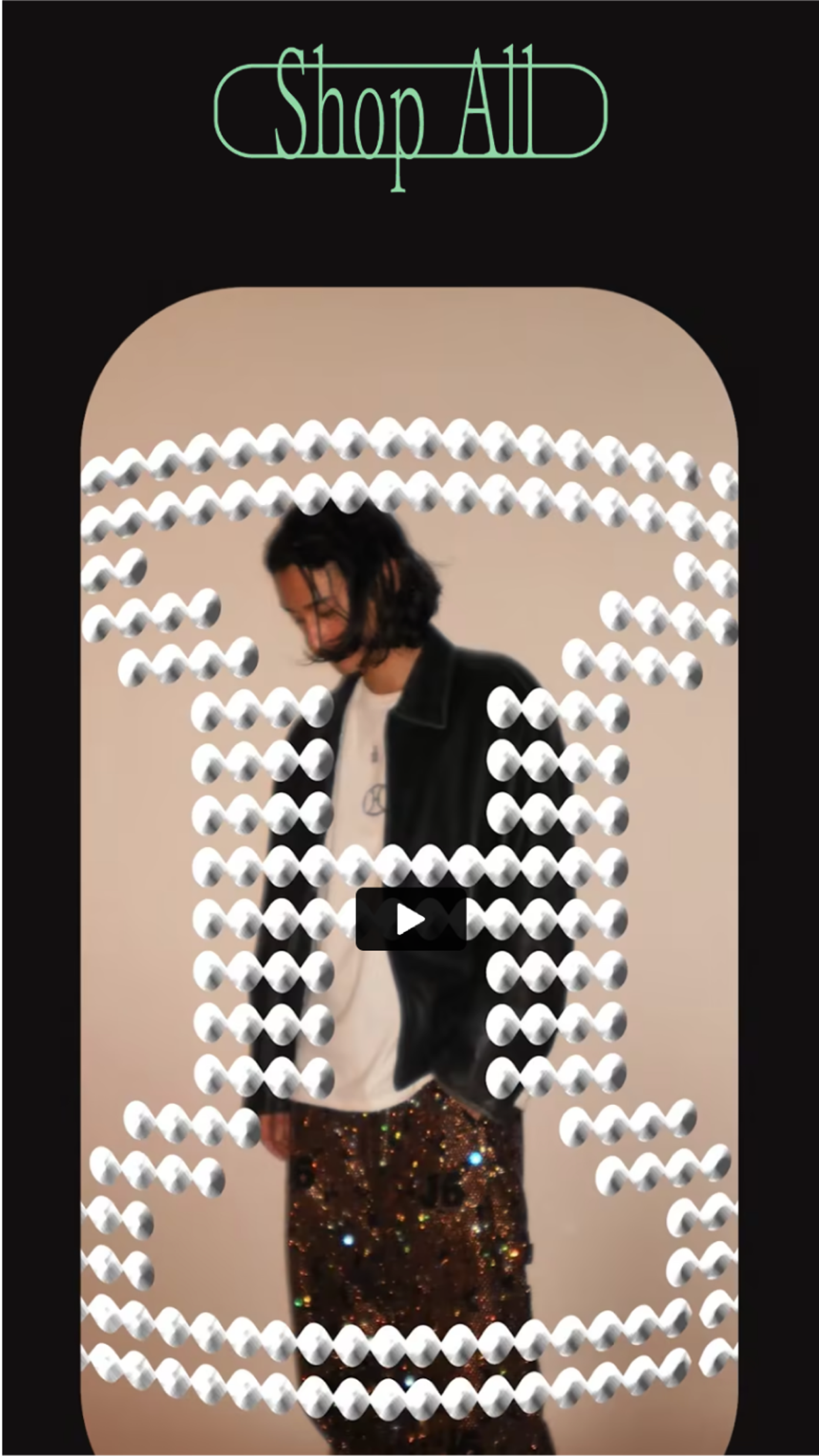 Mobile screenshot of an editorial video and Shop All button
