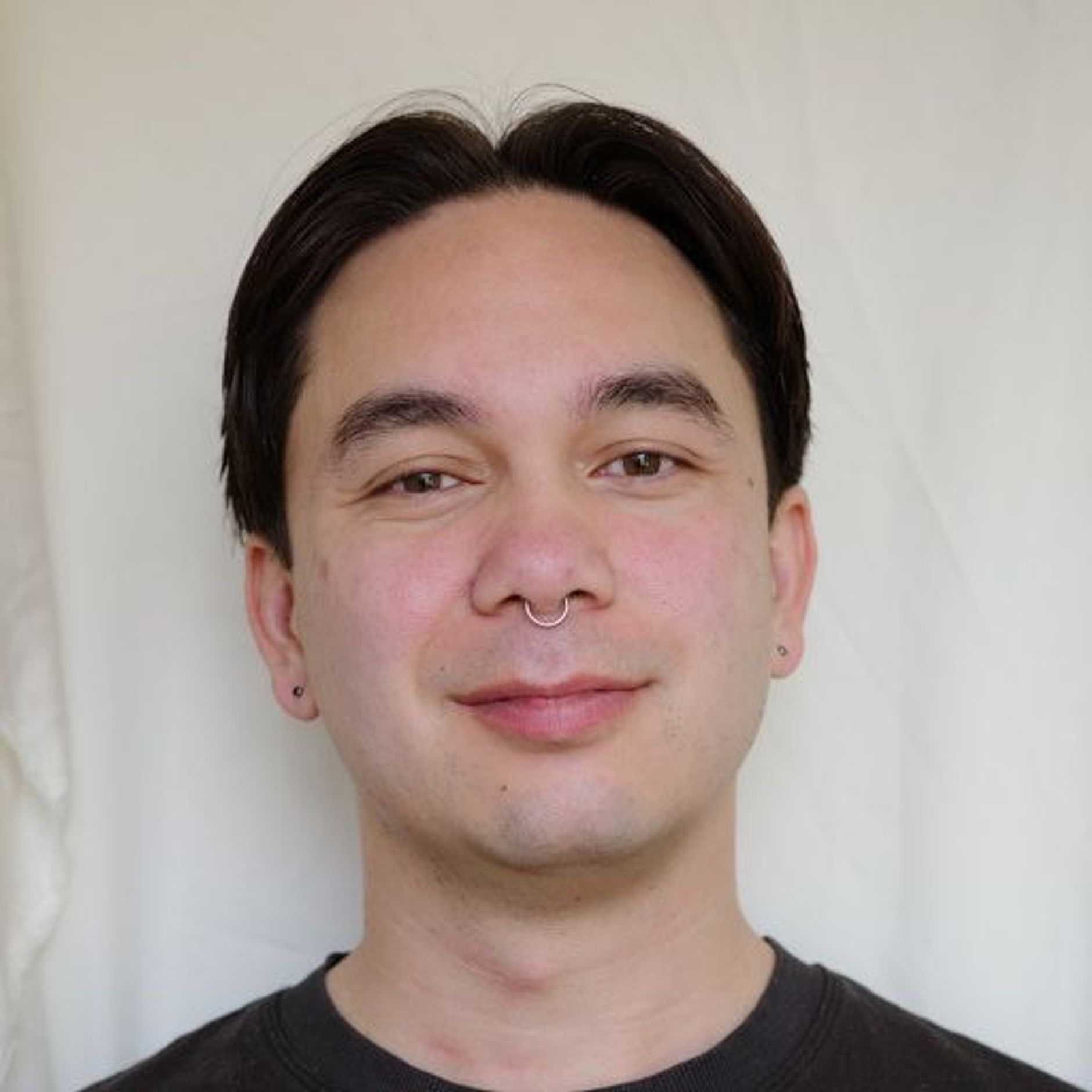 Headshot of Johnnie Regalado