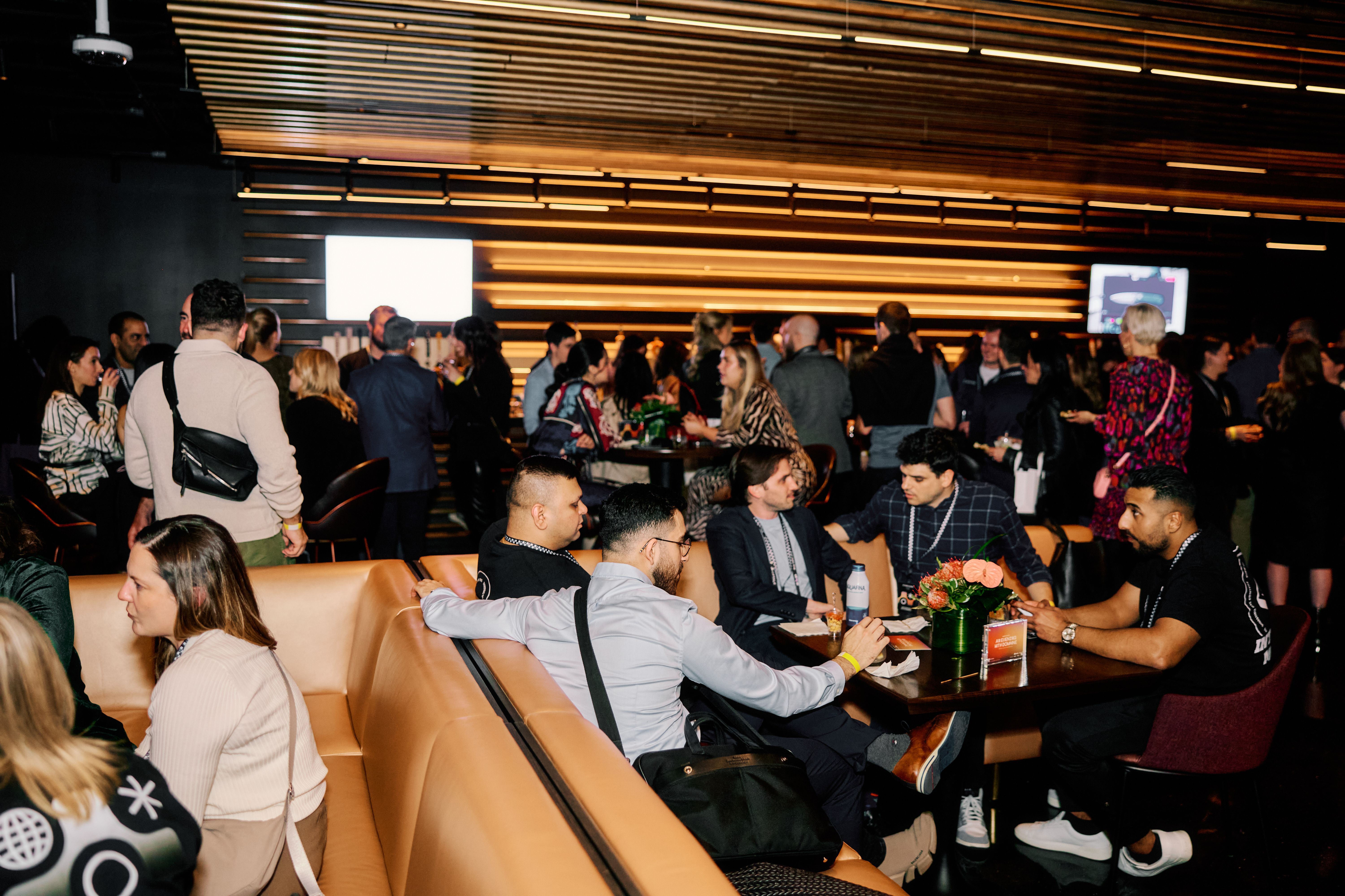 Guests enjoying the event in the Theory Lounge at the Las Vegas Sphere