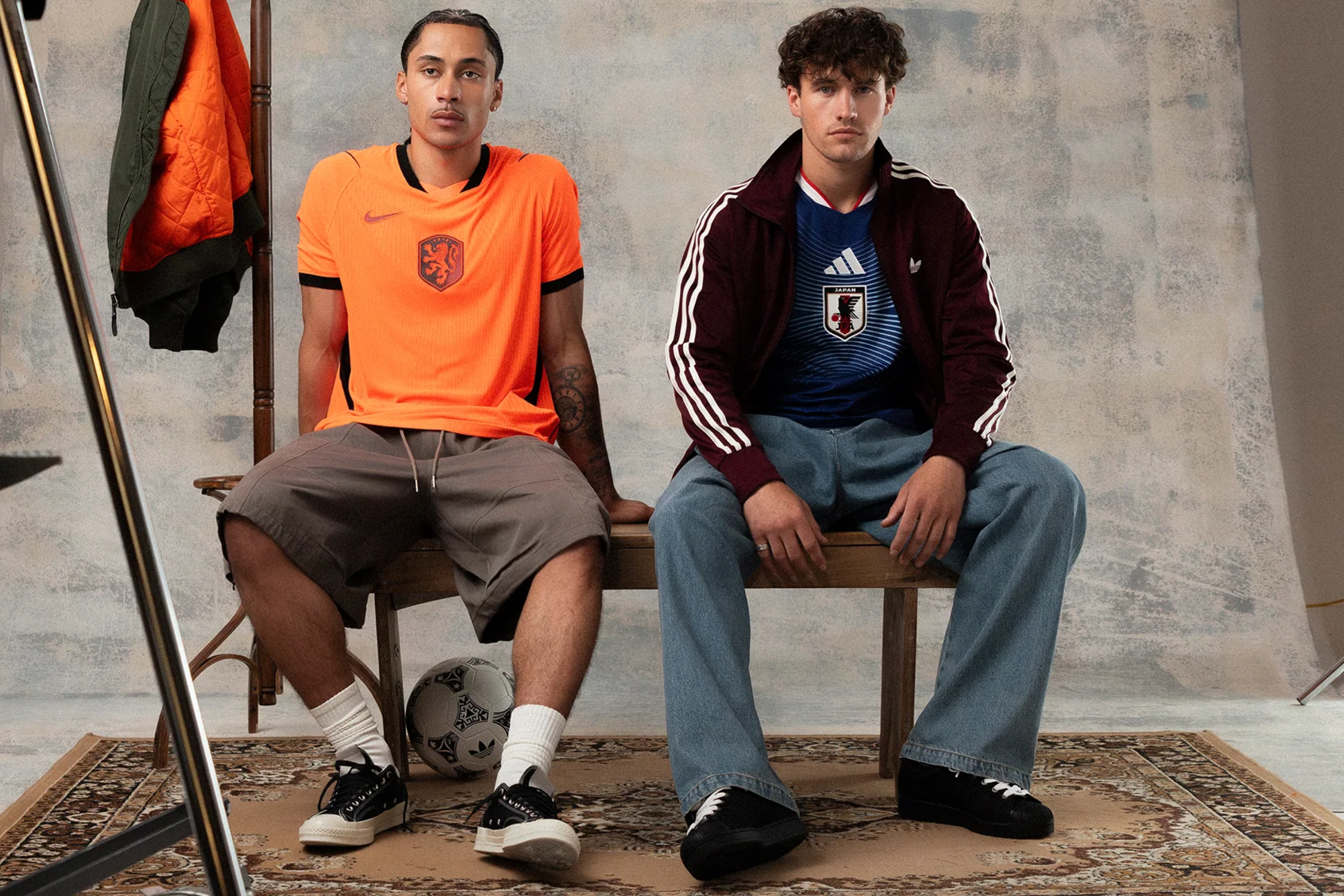 Two male models on a bench