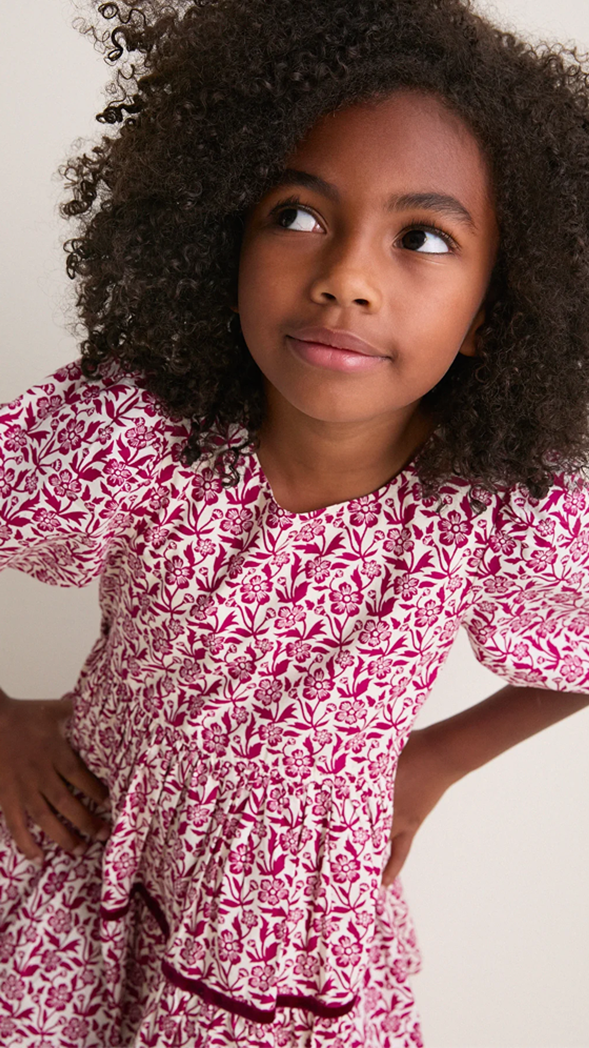 Little girl in pink flower dress