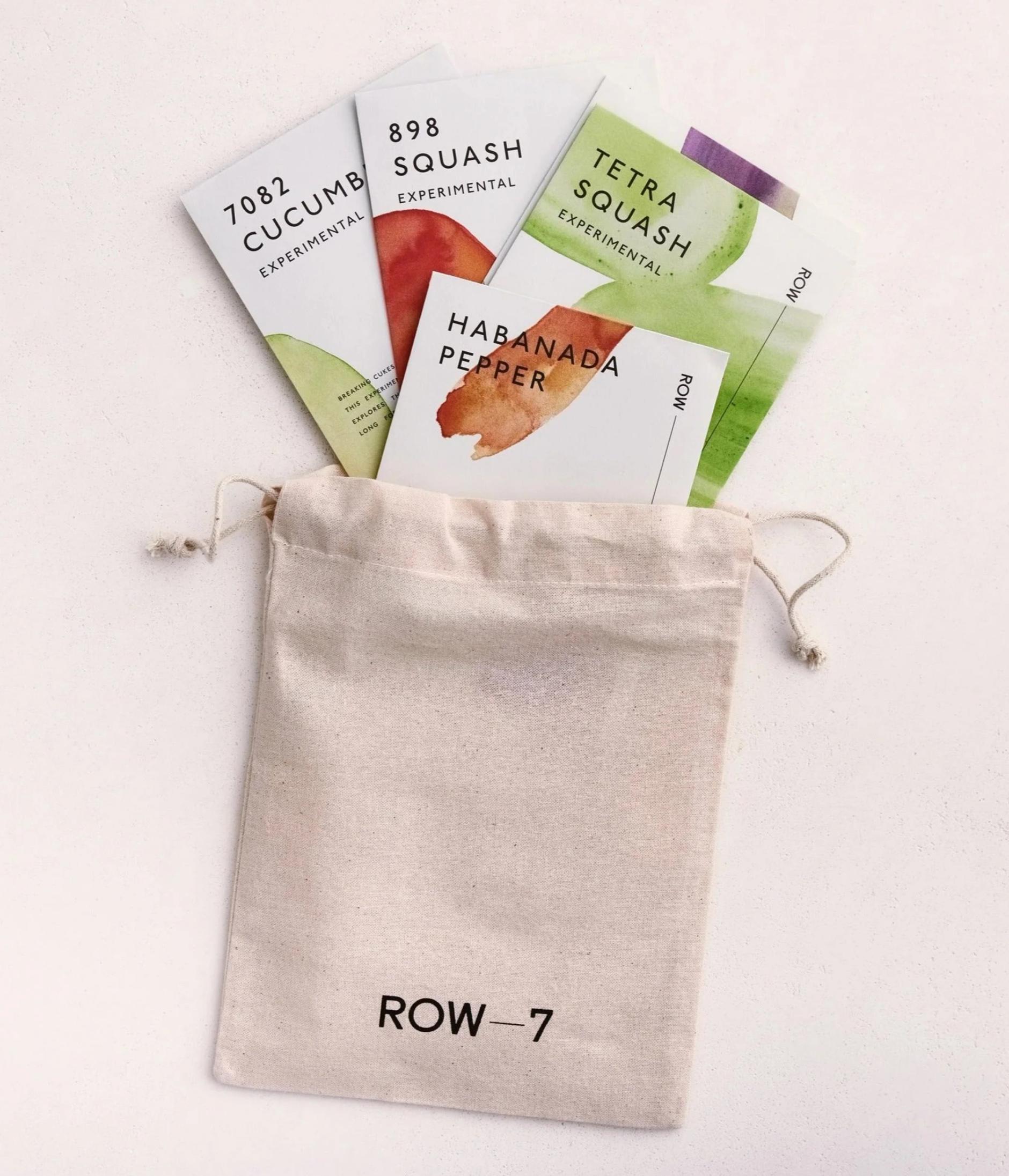 Seed packets in a small drawstring bag