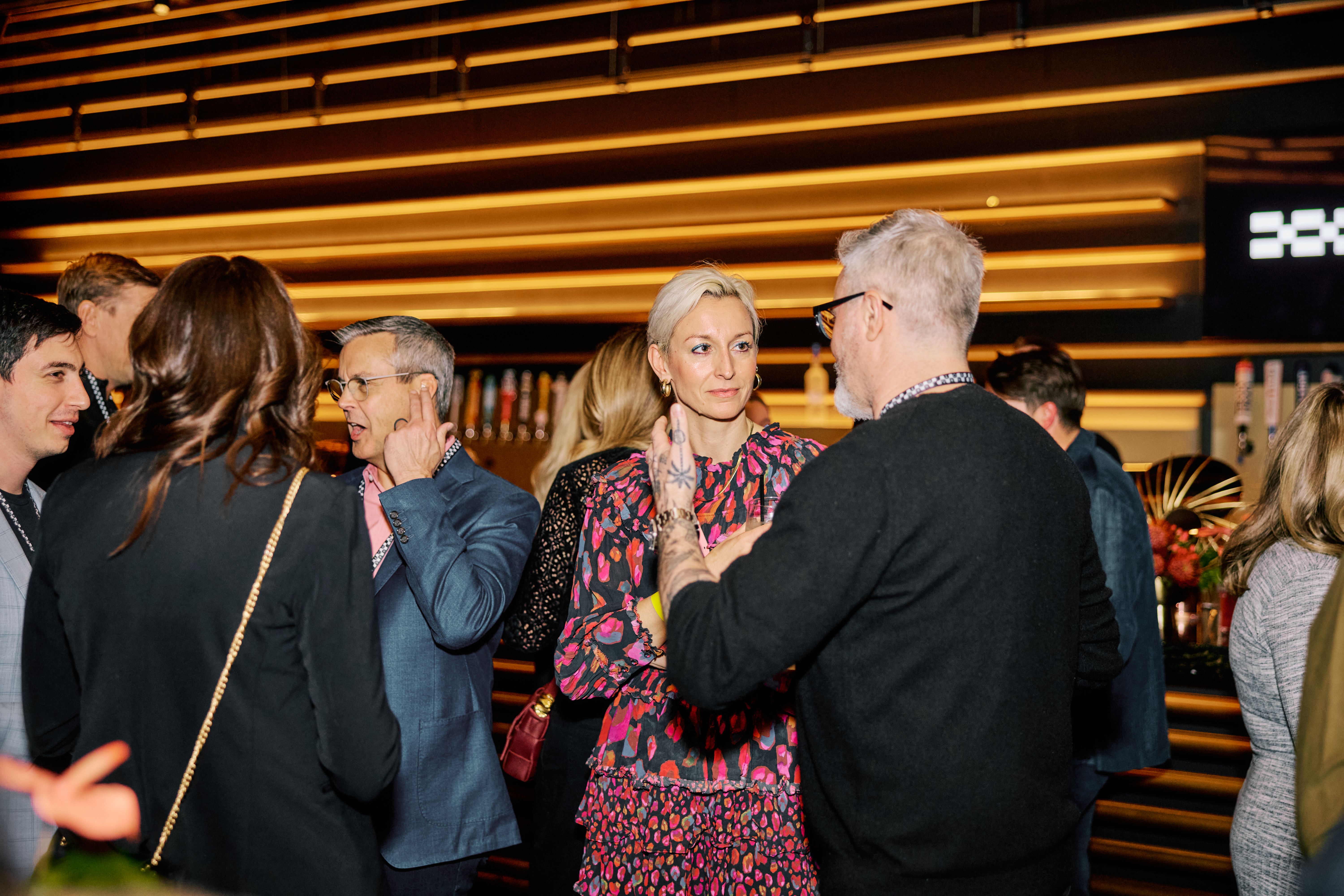 Guests enjoying the event in the Theory Lounge at the Las Vegas Sphere